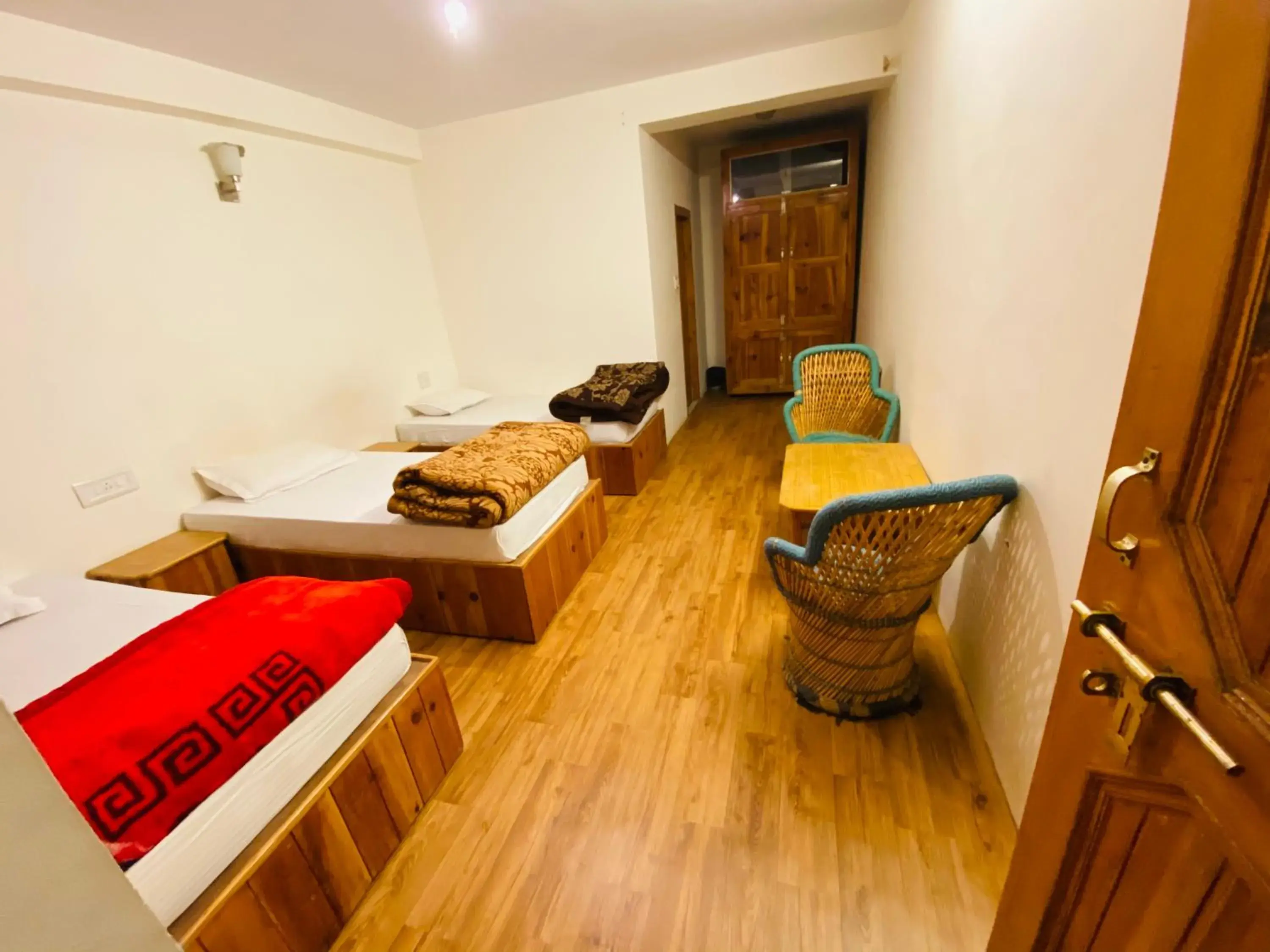 Deluxe Triple Room in Madpackers Manali Deluxe Triple Room in Madpackers Manali
