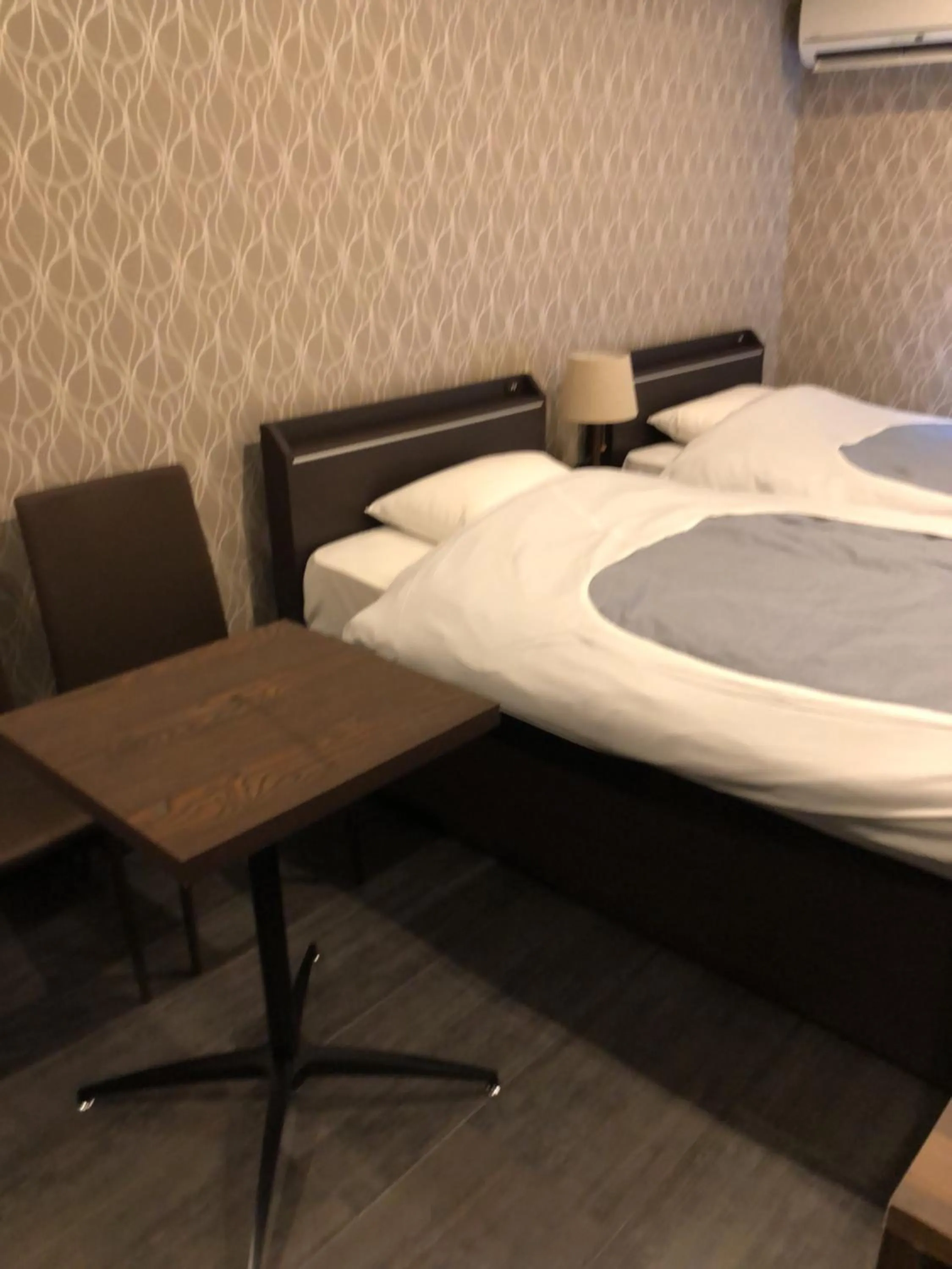 Bed in Hatoya Hotel