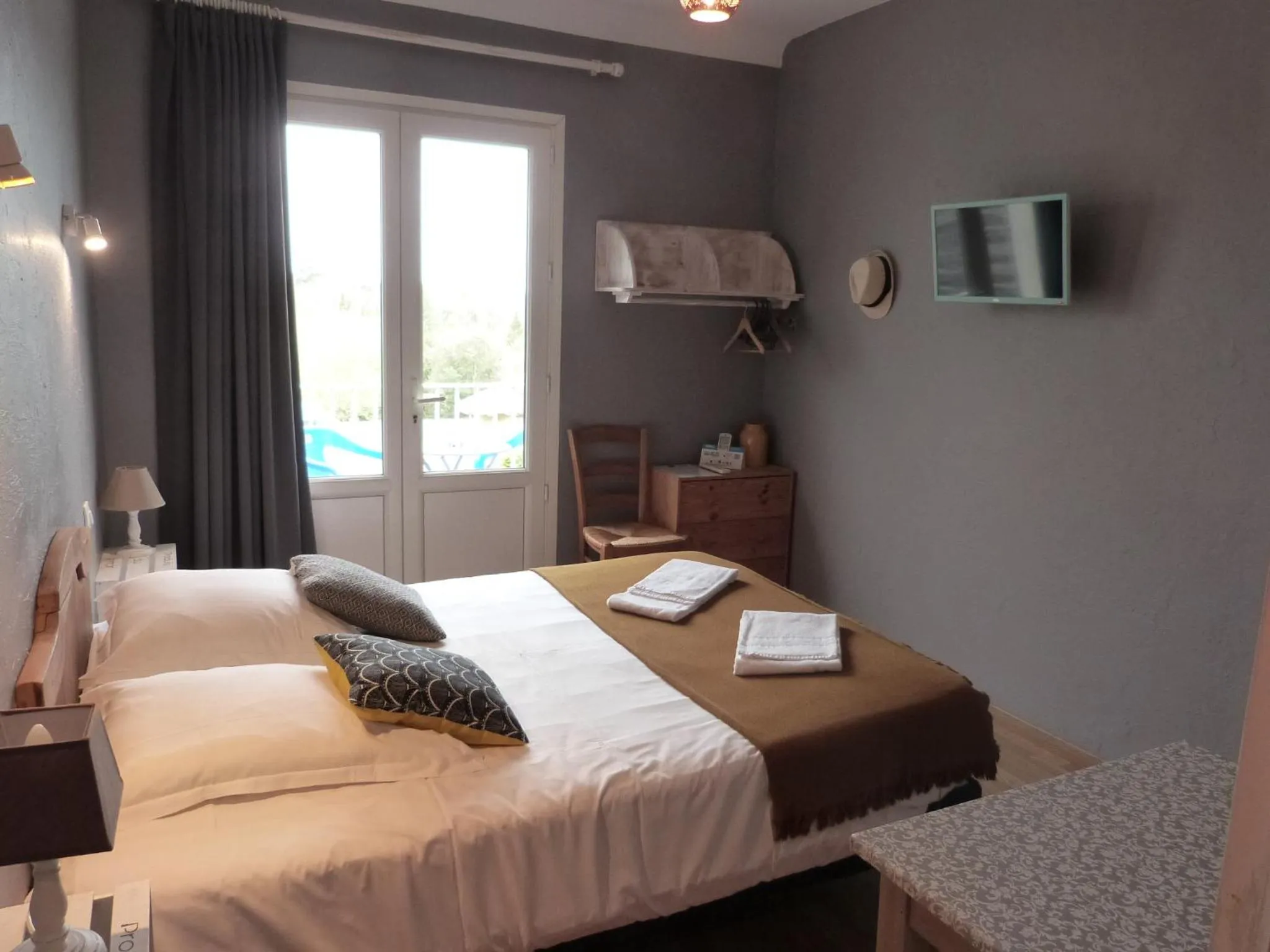 Photo of the whole room, Bed in Logis Hôtel Restaurant La Borie