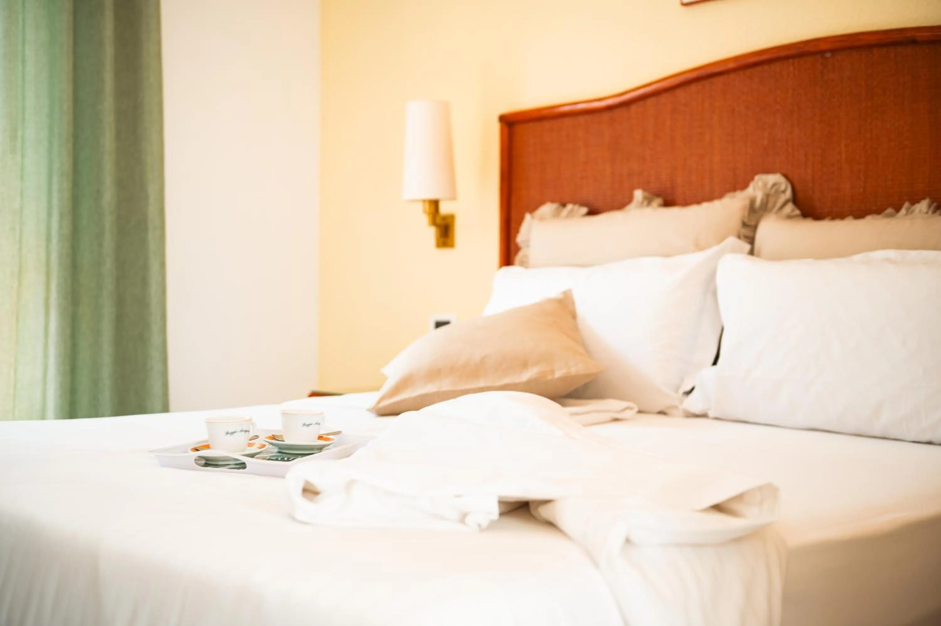 Photo of the whole room, Bed in Poggio Aragosta Hotel & Spa