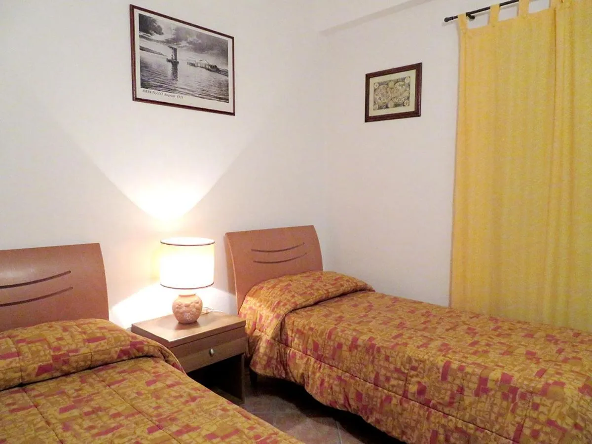 Photo of the whole room, Bed in Albergo La Perla