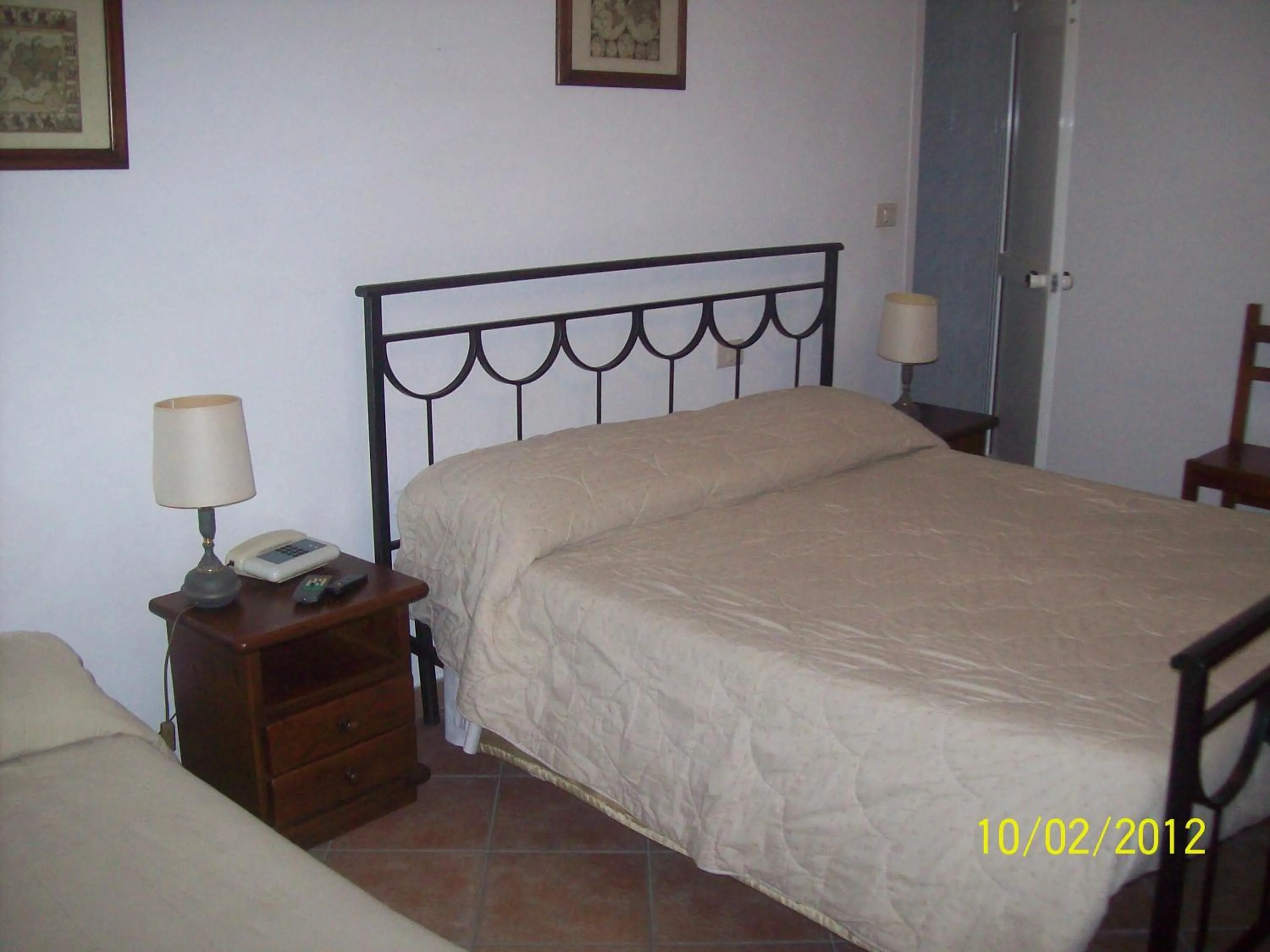 Photo of the whole room, Bed in Albergo La Perla