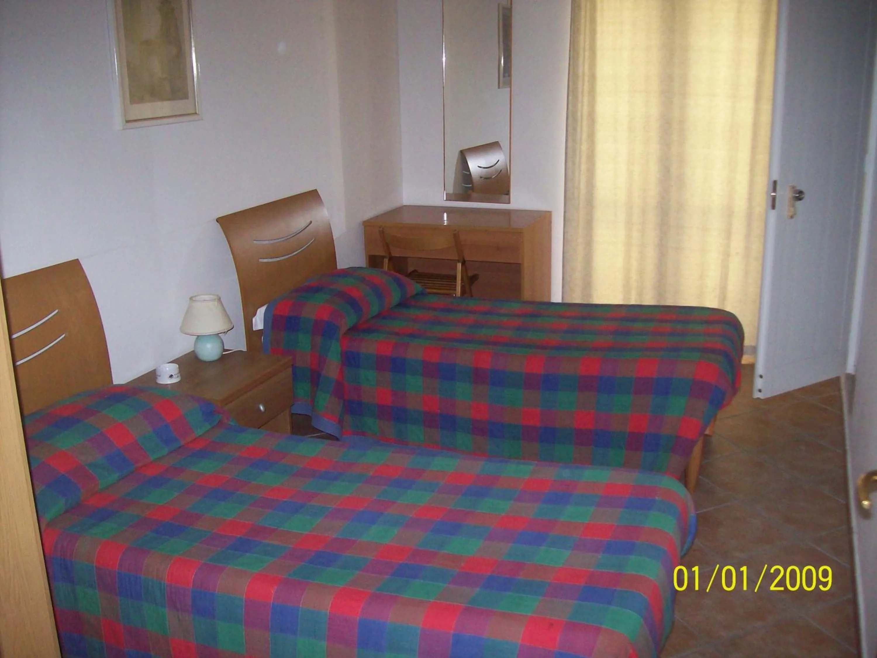 Photo of the whole room, Bed in Albergo La Perla