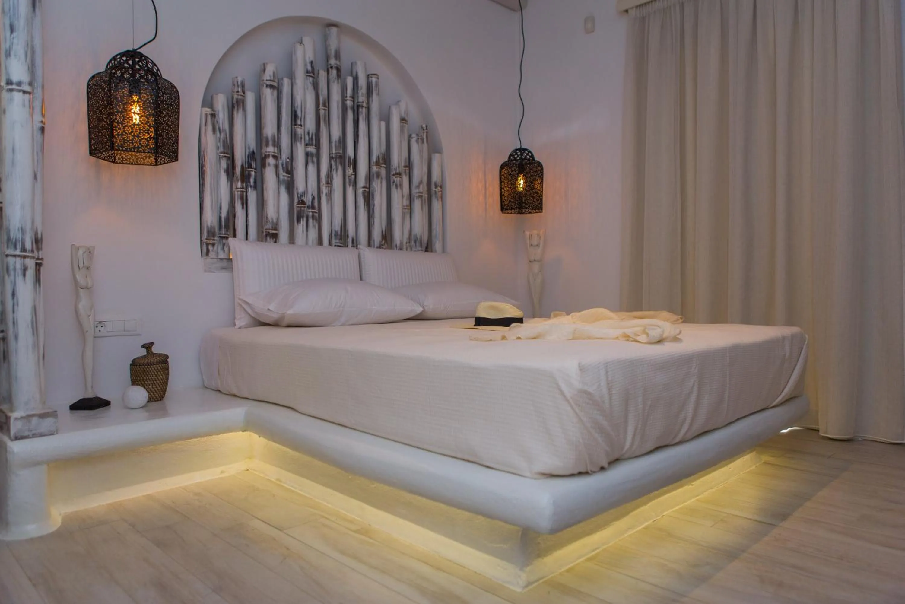 Bed in Naxian Lounge Villas