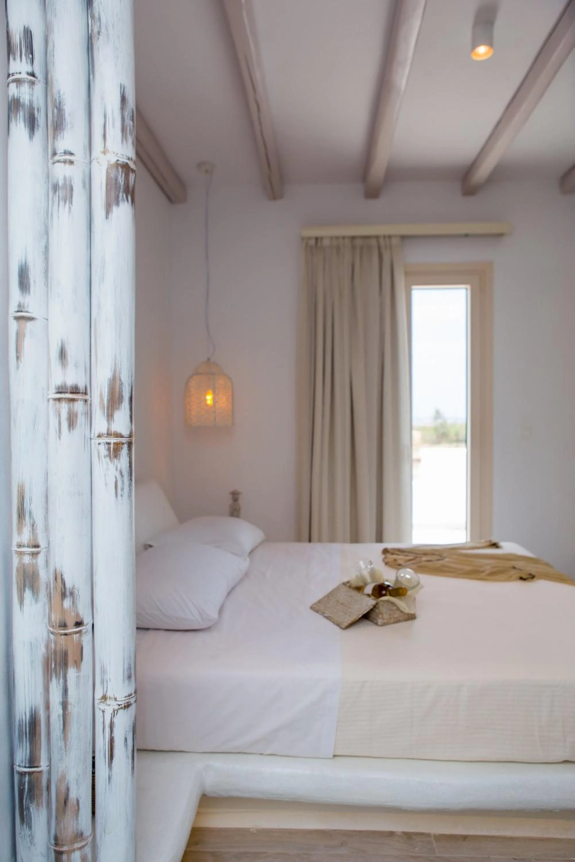 Bed in Naxian Lounge Villas