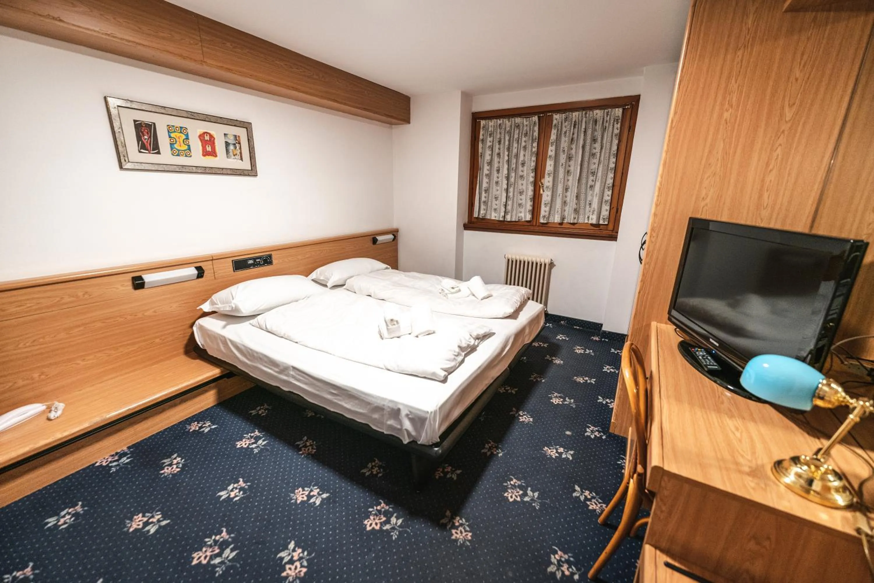 Bed in Smart Hotel Renzi