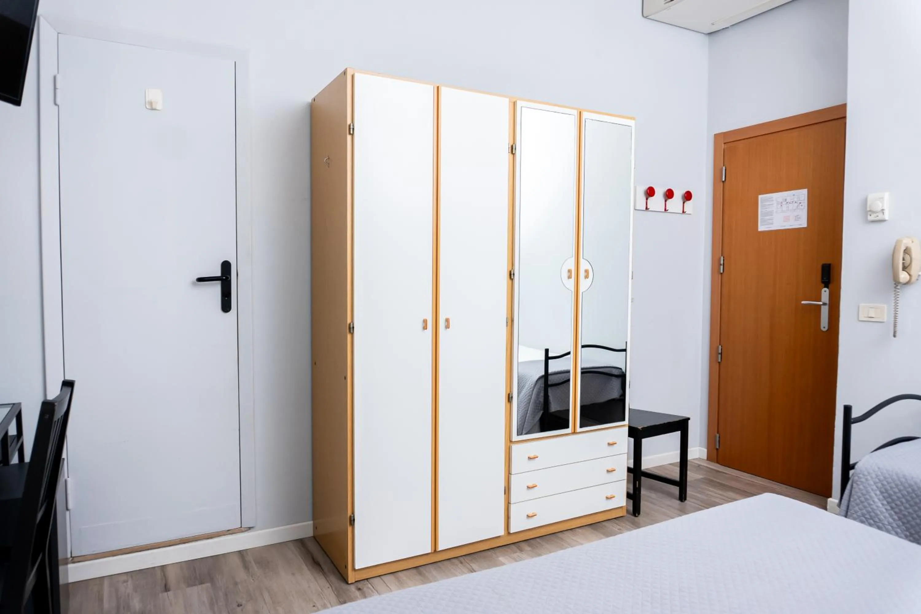 wardrobe, Bed in Hotel Mirabella