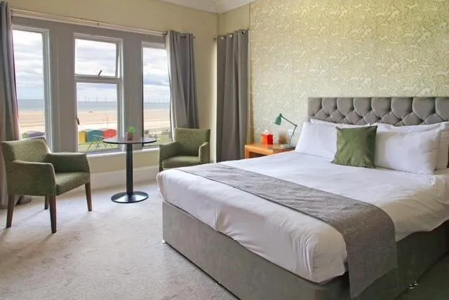 Bed in The Marine Hotel