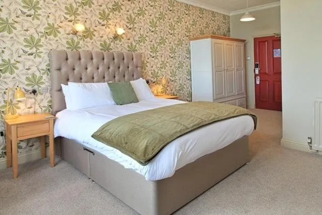 Bed in The Marine Hotel