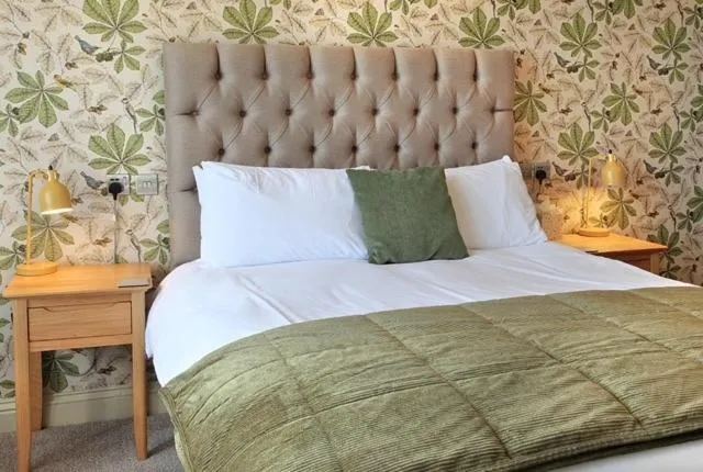 Bed in The Marine Hotel