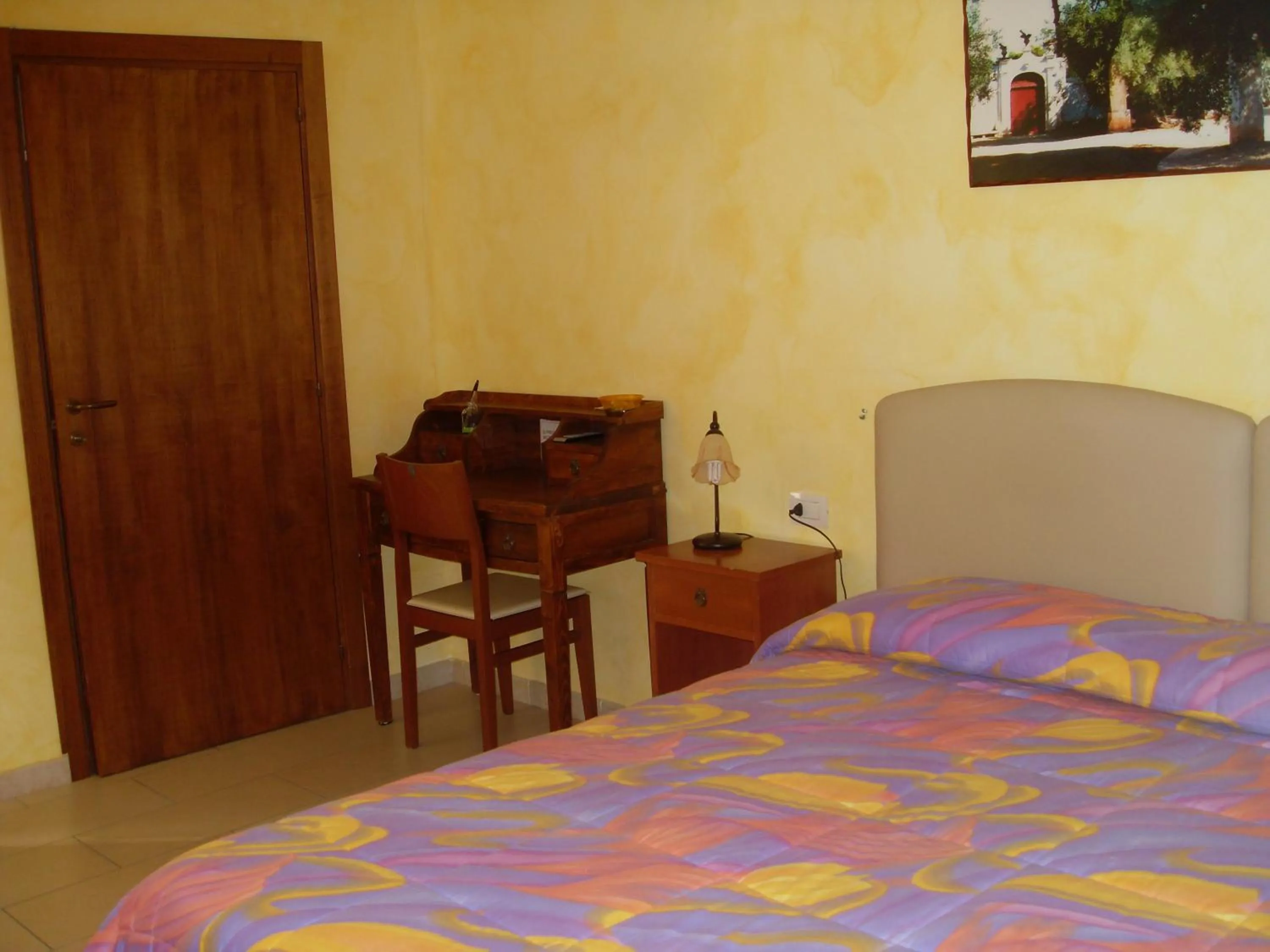 Decorative detail, Bed in B&B Frammenti D'Itria