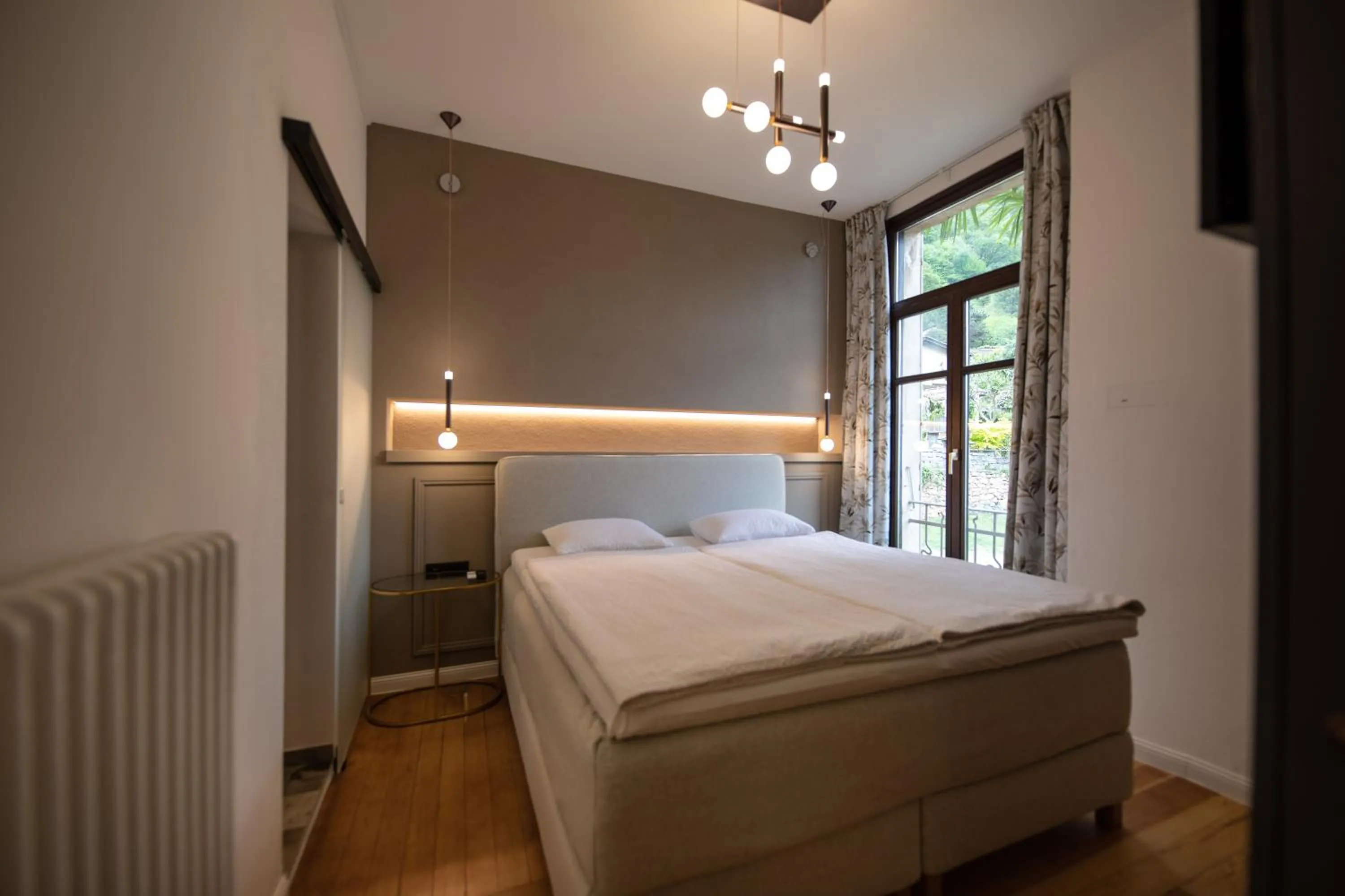 Bed in Arbostora Charme Hotel