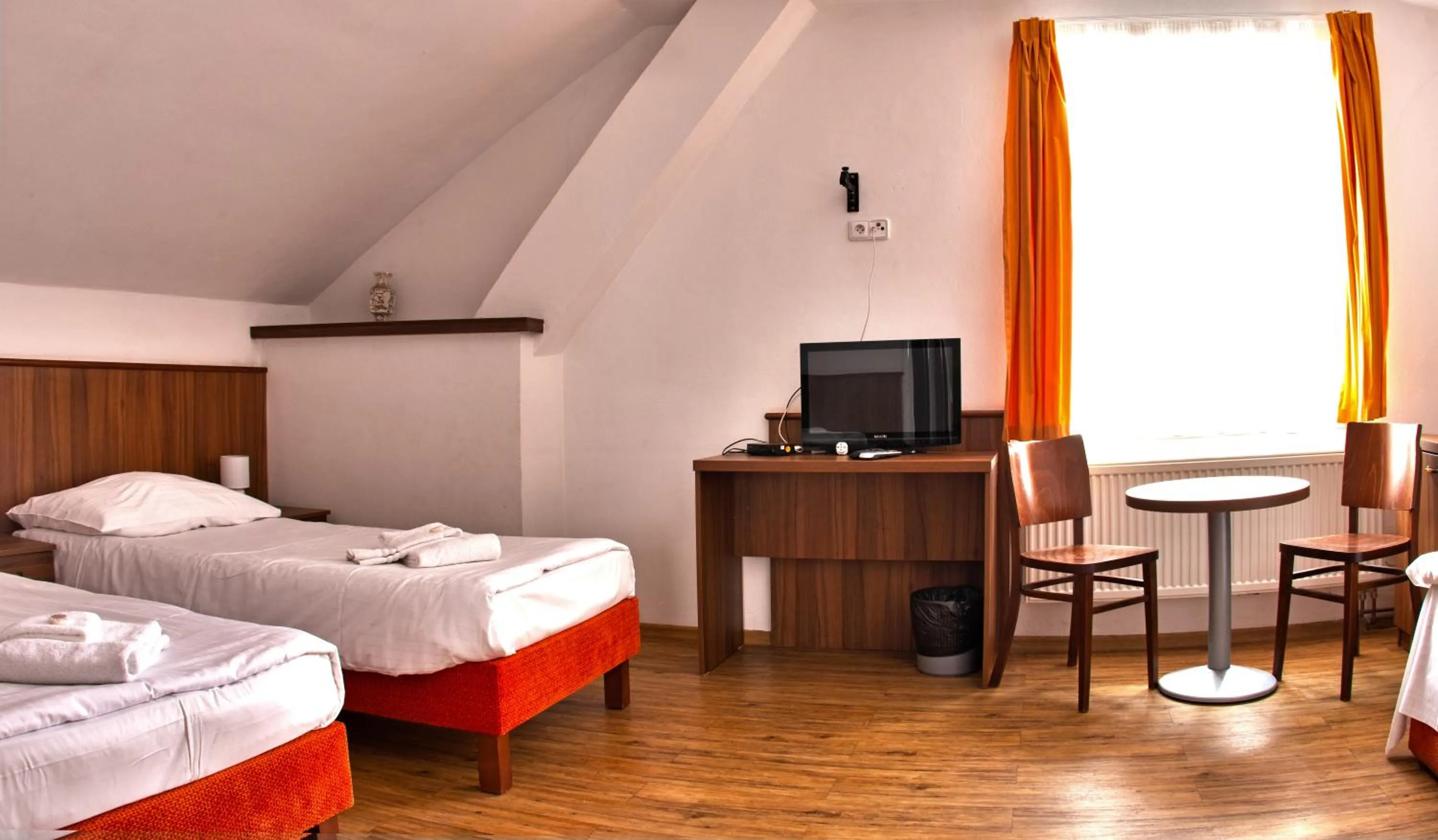 Seating area, Bed in Hotel Kácov