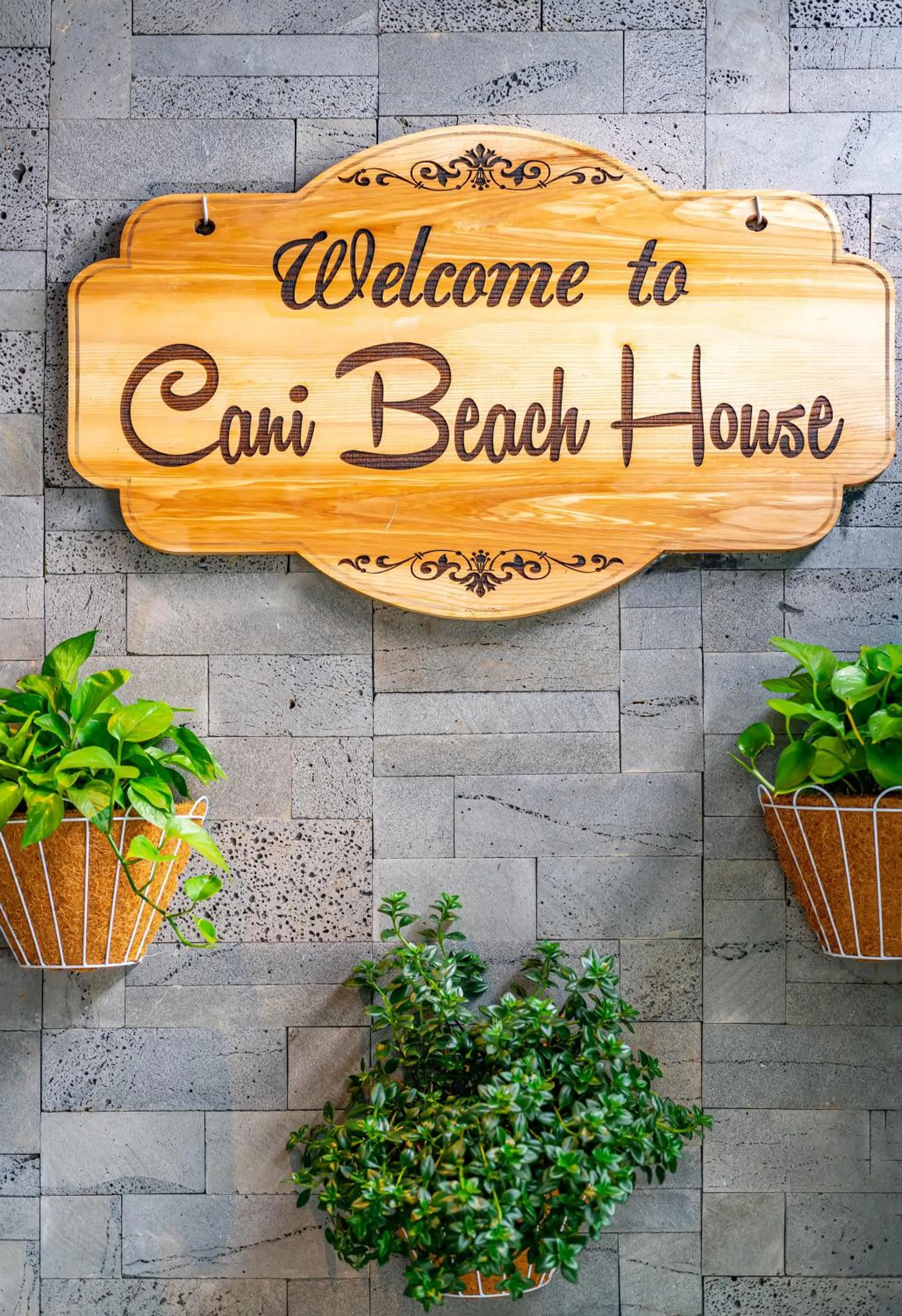 Property logo or sign in Cani Beach House