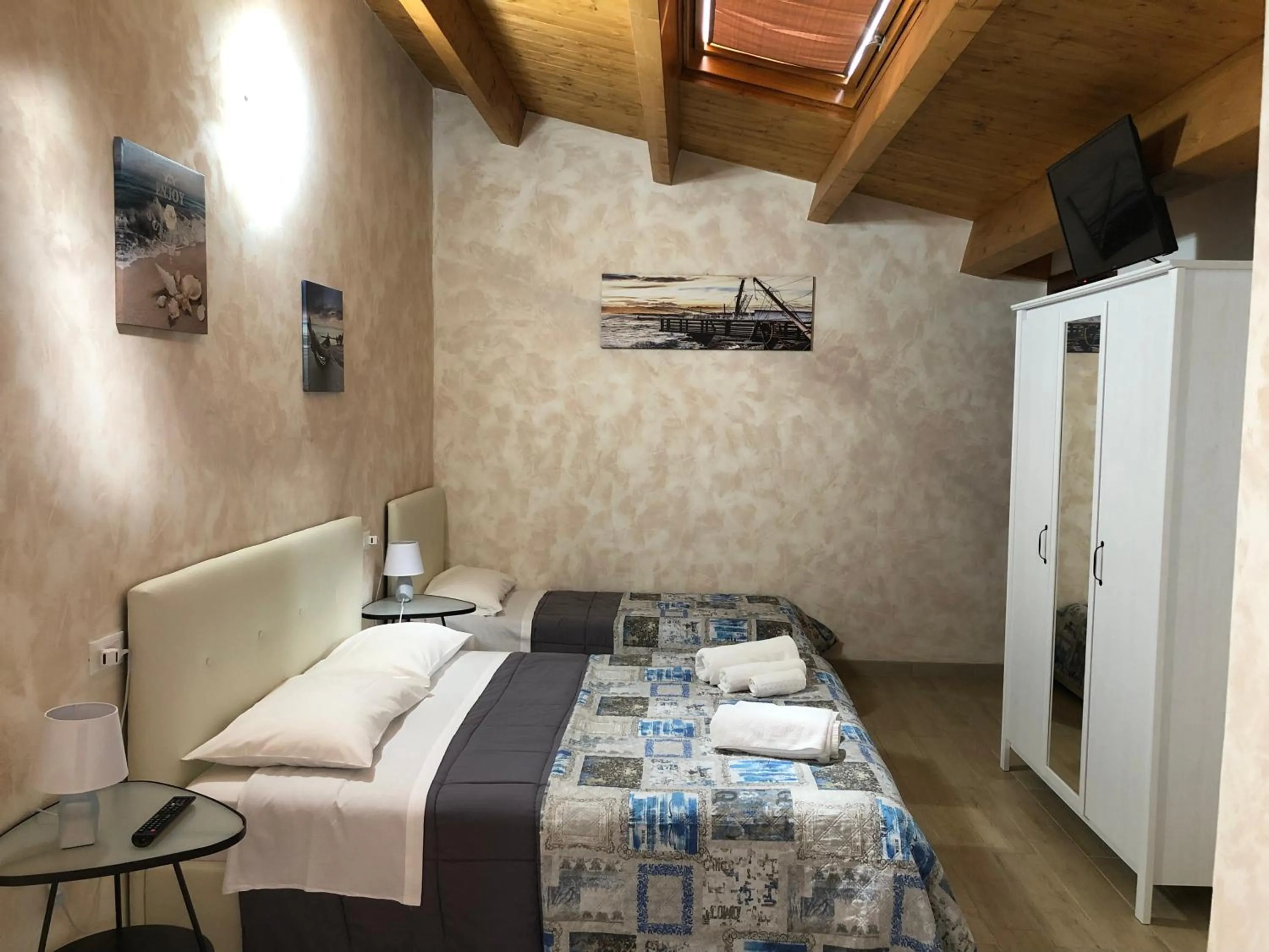 TV and multimedia, Bed in B&B Le Mansarde