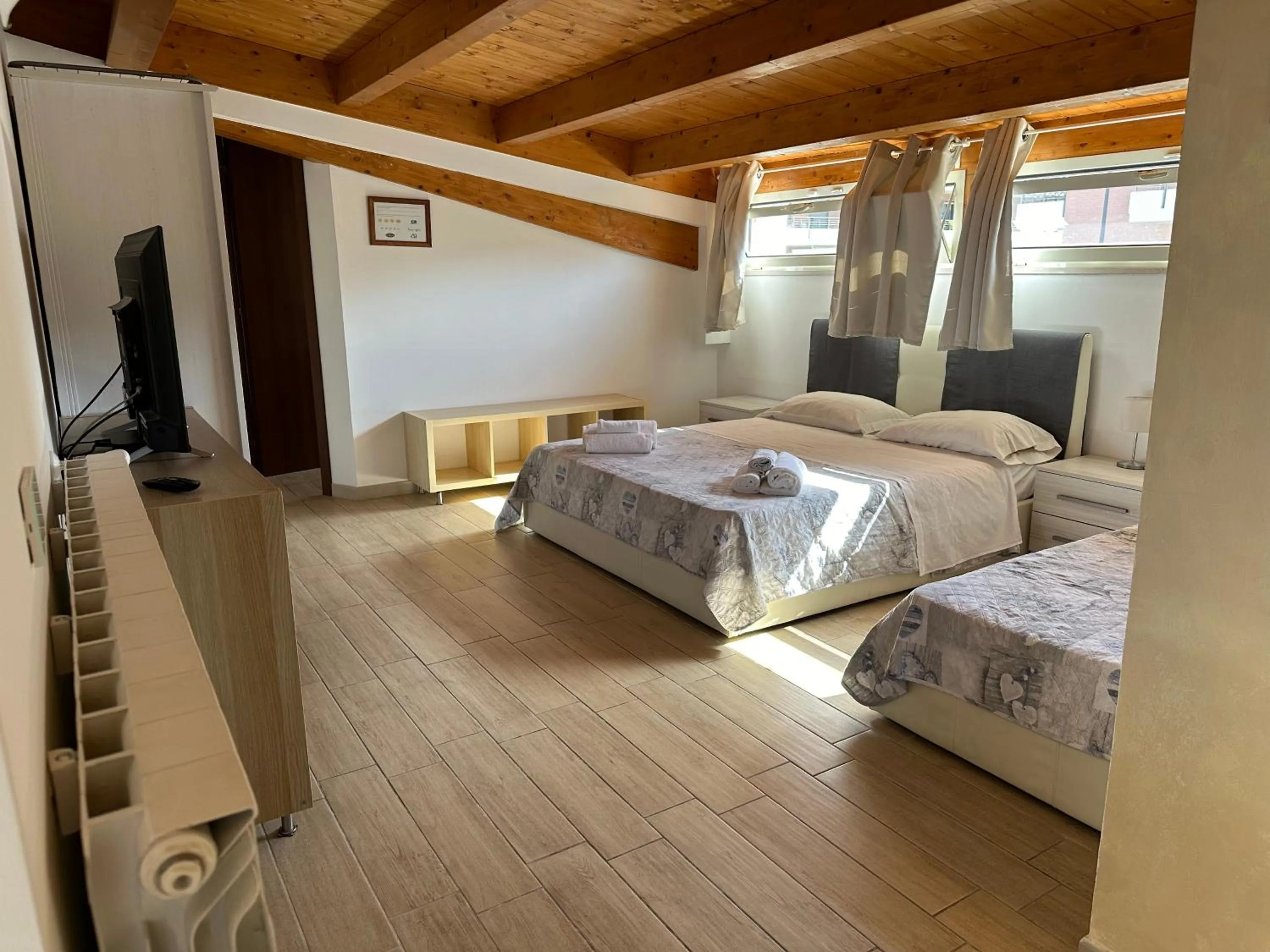 Bed in B&B Le Mansarde