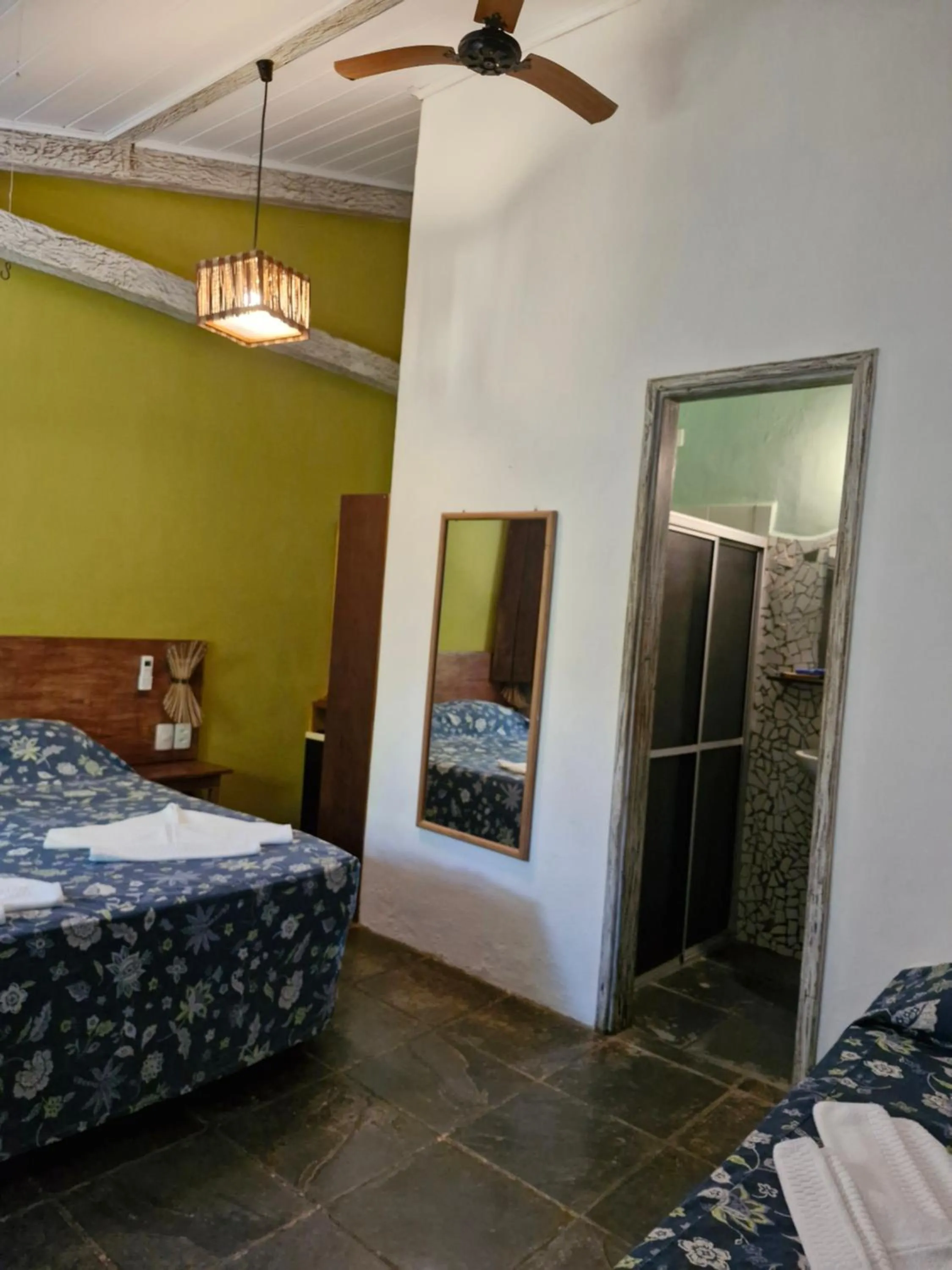 Photo of the whole room, Bed in Pousada Bucaneiros