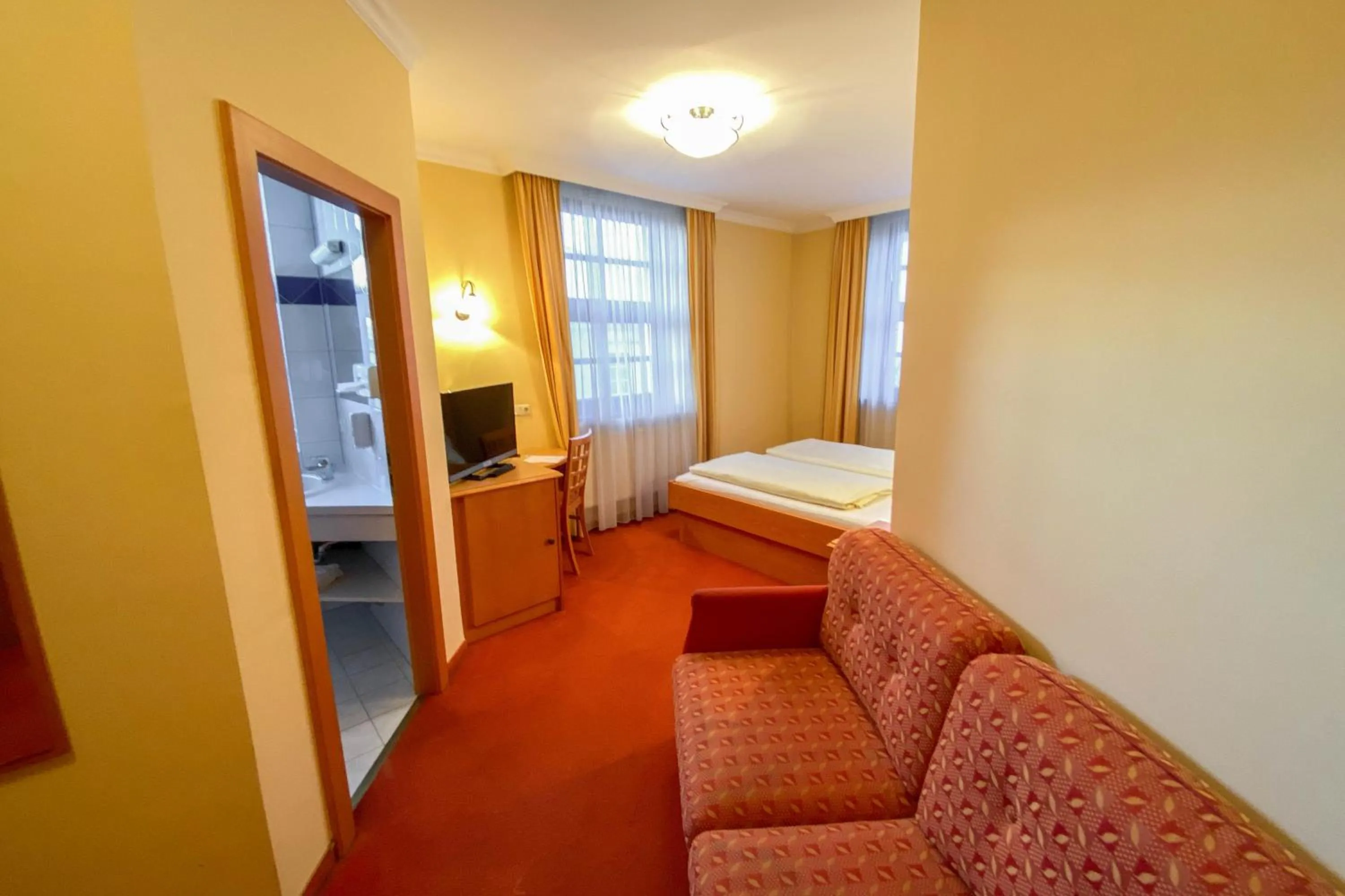 Photo of the whole room, Bed in Landhotel Gasthof Bauböck