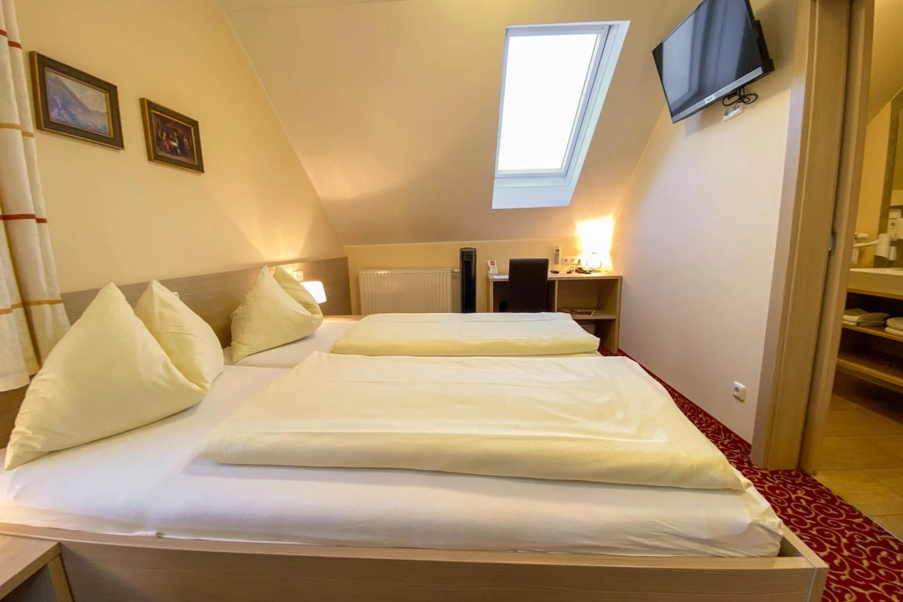 Bed in Landhotel Gasthof Bauböck