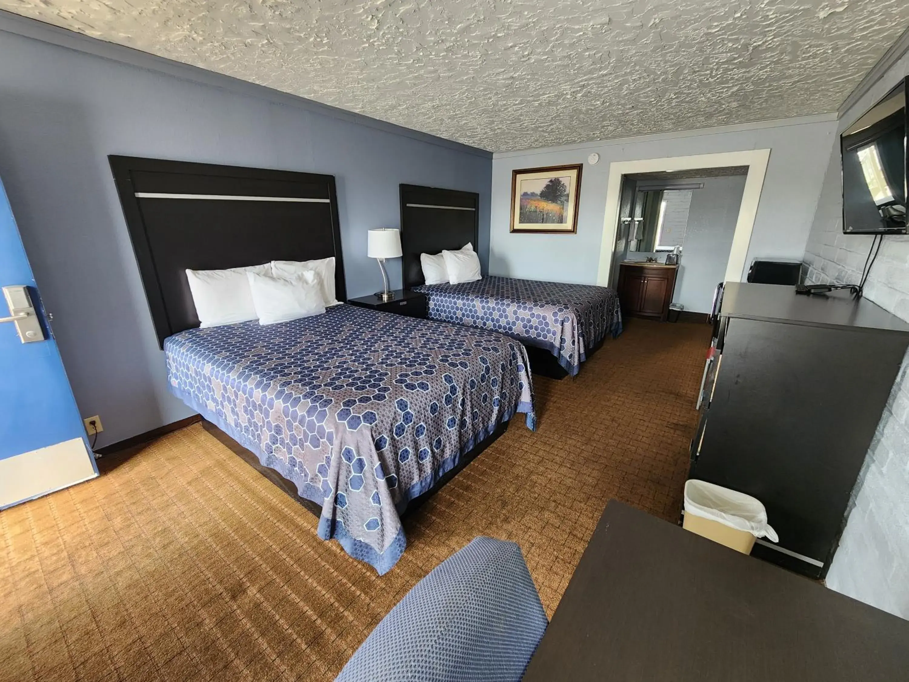 Queen Room with Two Queen Beds in Carthage Inn Queen Room with Two Queen Beds in Carthage Inn