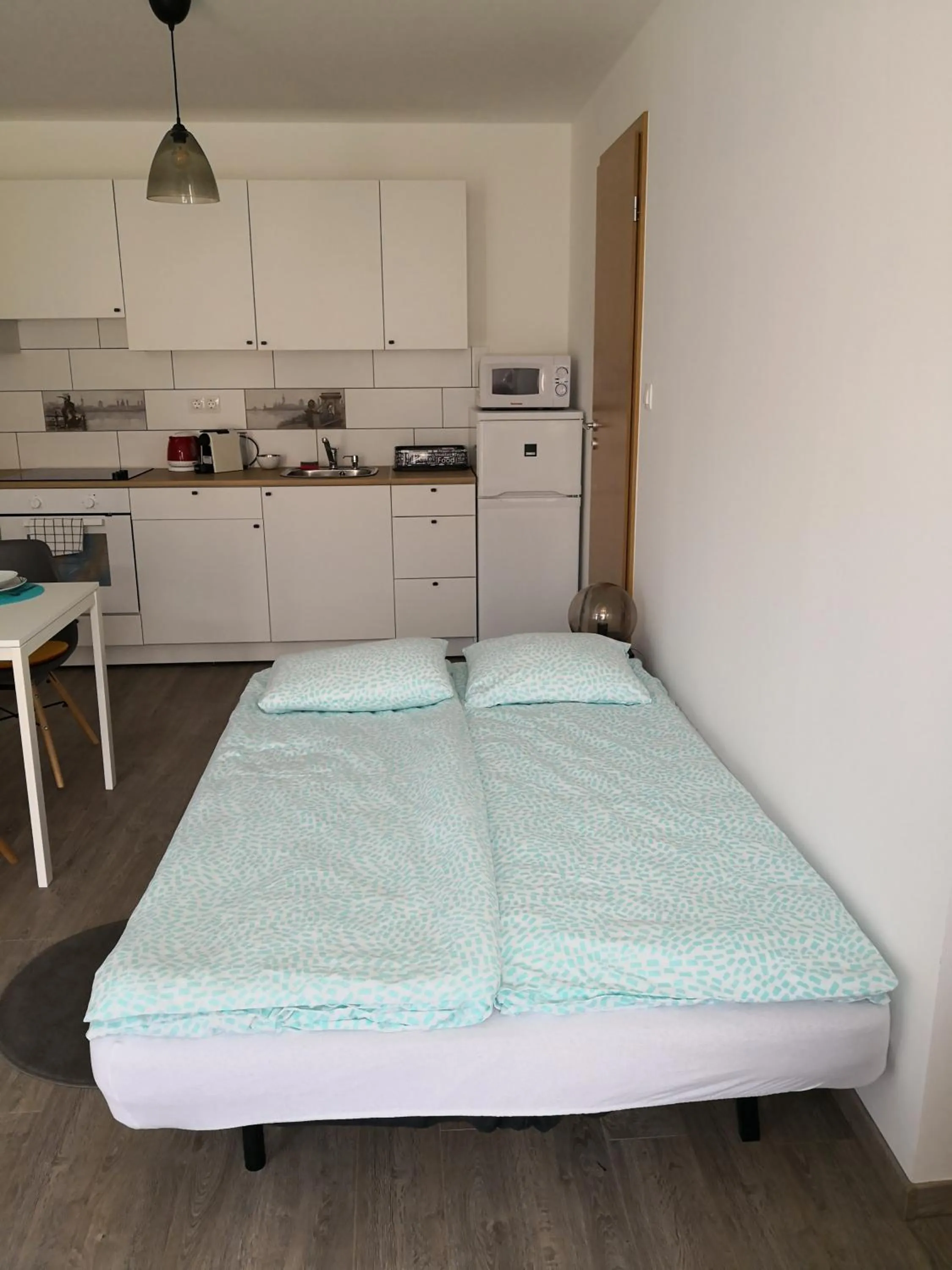 Bed in Green Garden Plus Apartman
