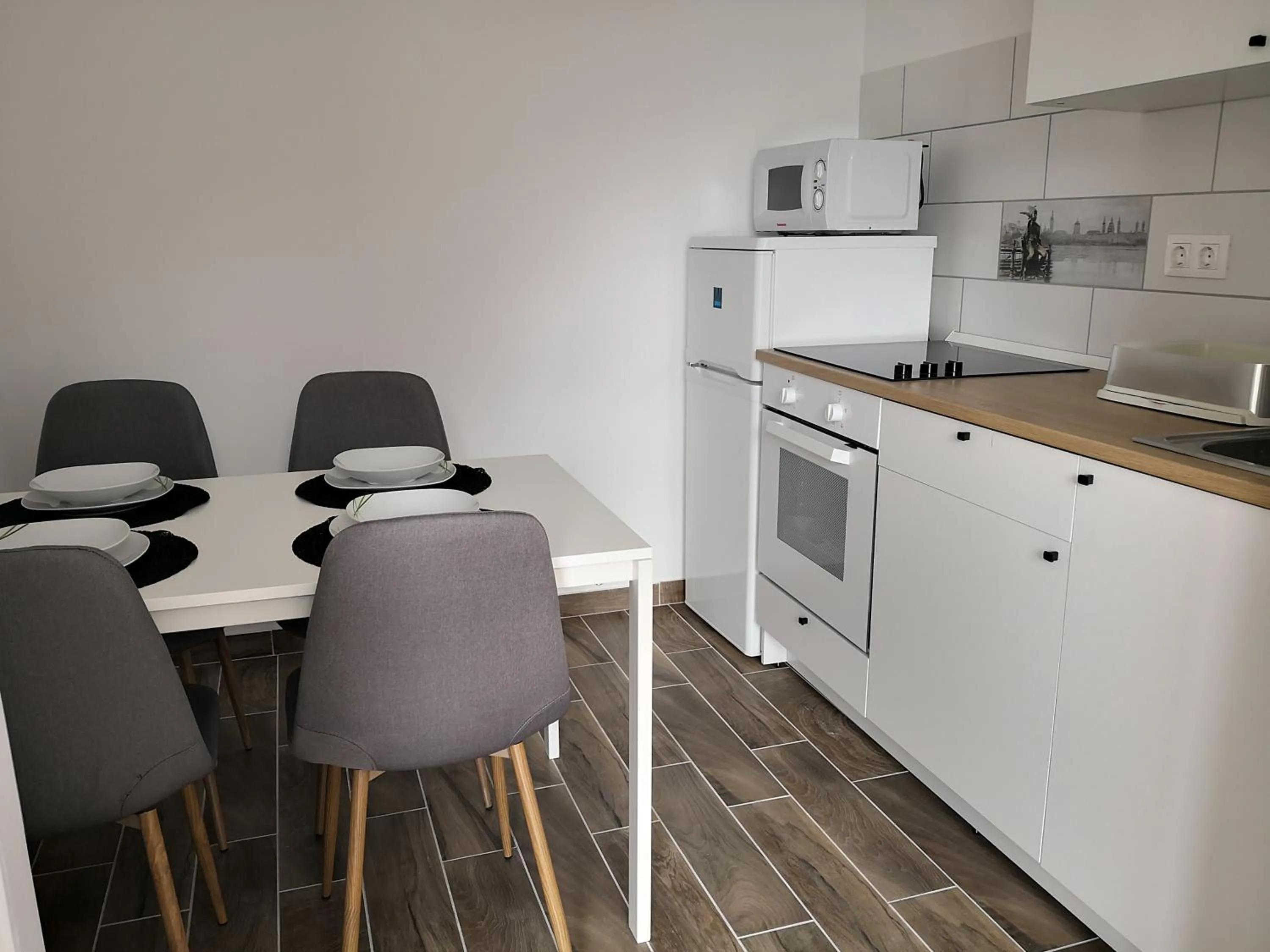 Kitchen or kitchenette in Green Garden Plus Apartman