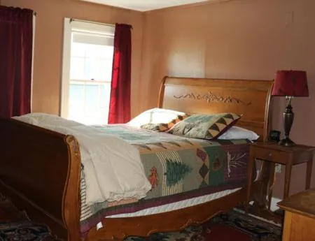 Bed in Wildcat Inn and Tavern