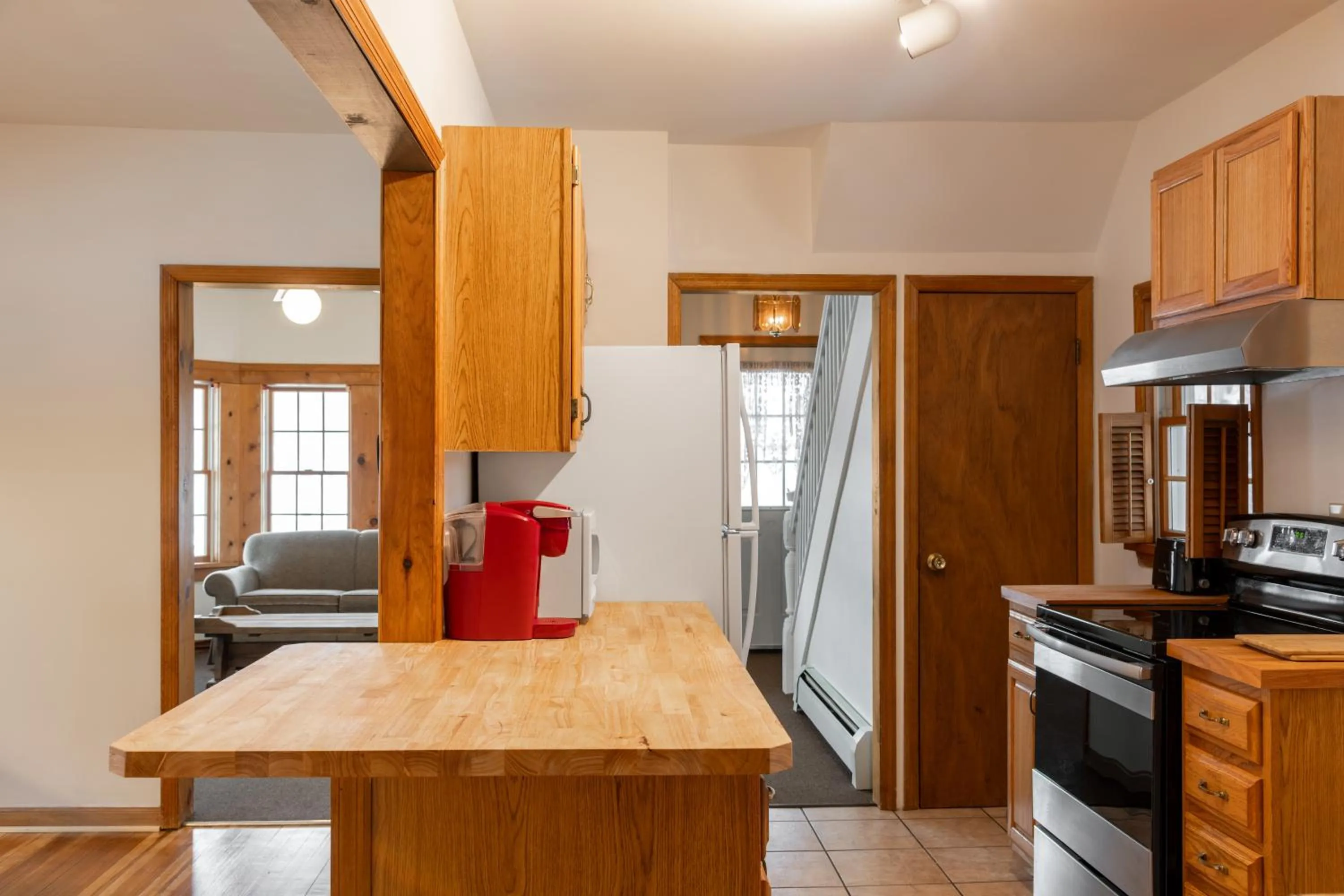kitchen in Sara Placid Inn & Suites