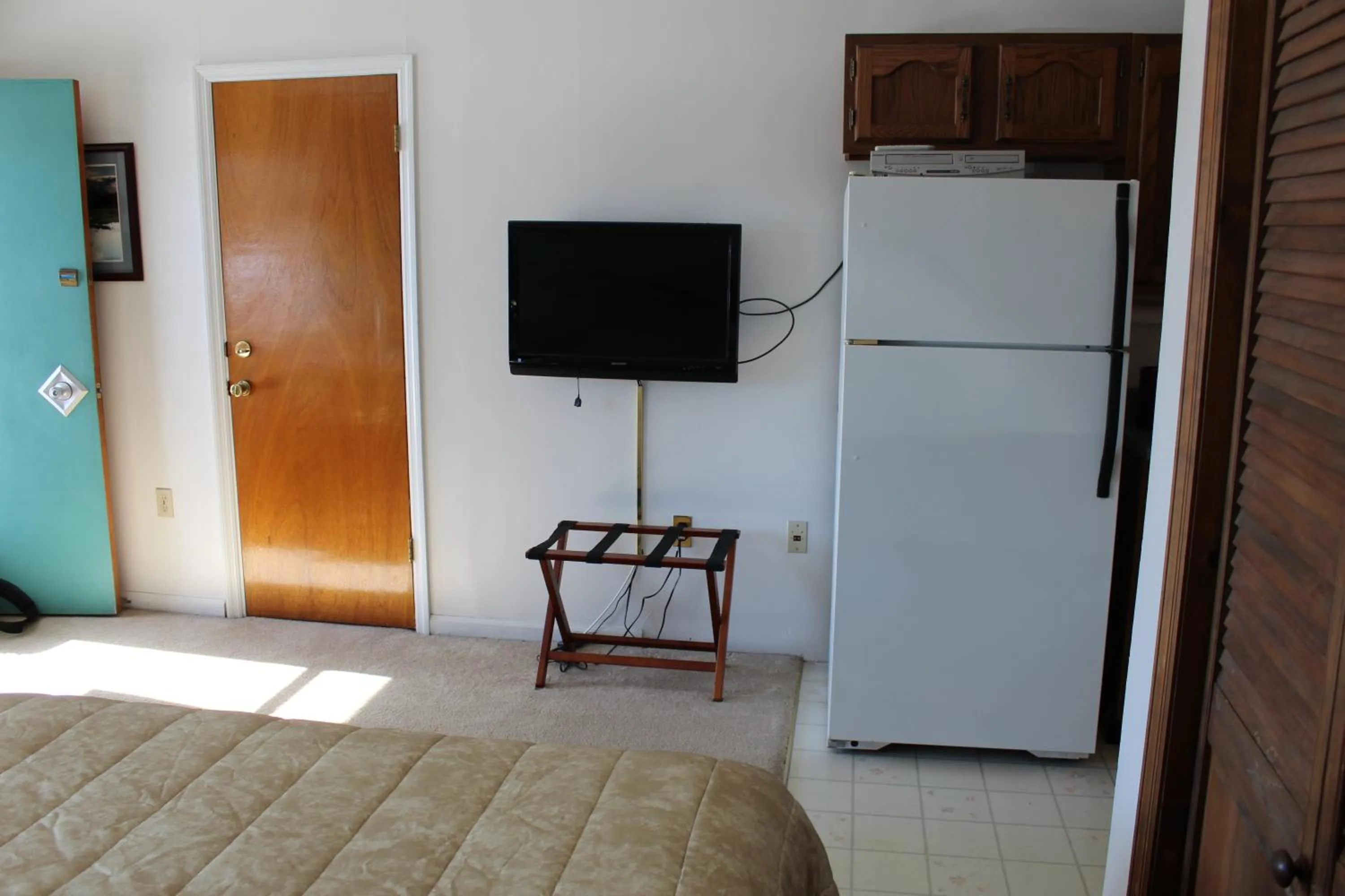 Kitchen or kitchenette in Sara Placid Inn & Suites