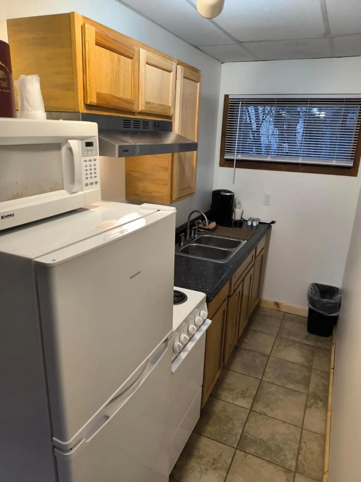 Kitchen or kitchenette in Sara Placid Inn & Suites