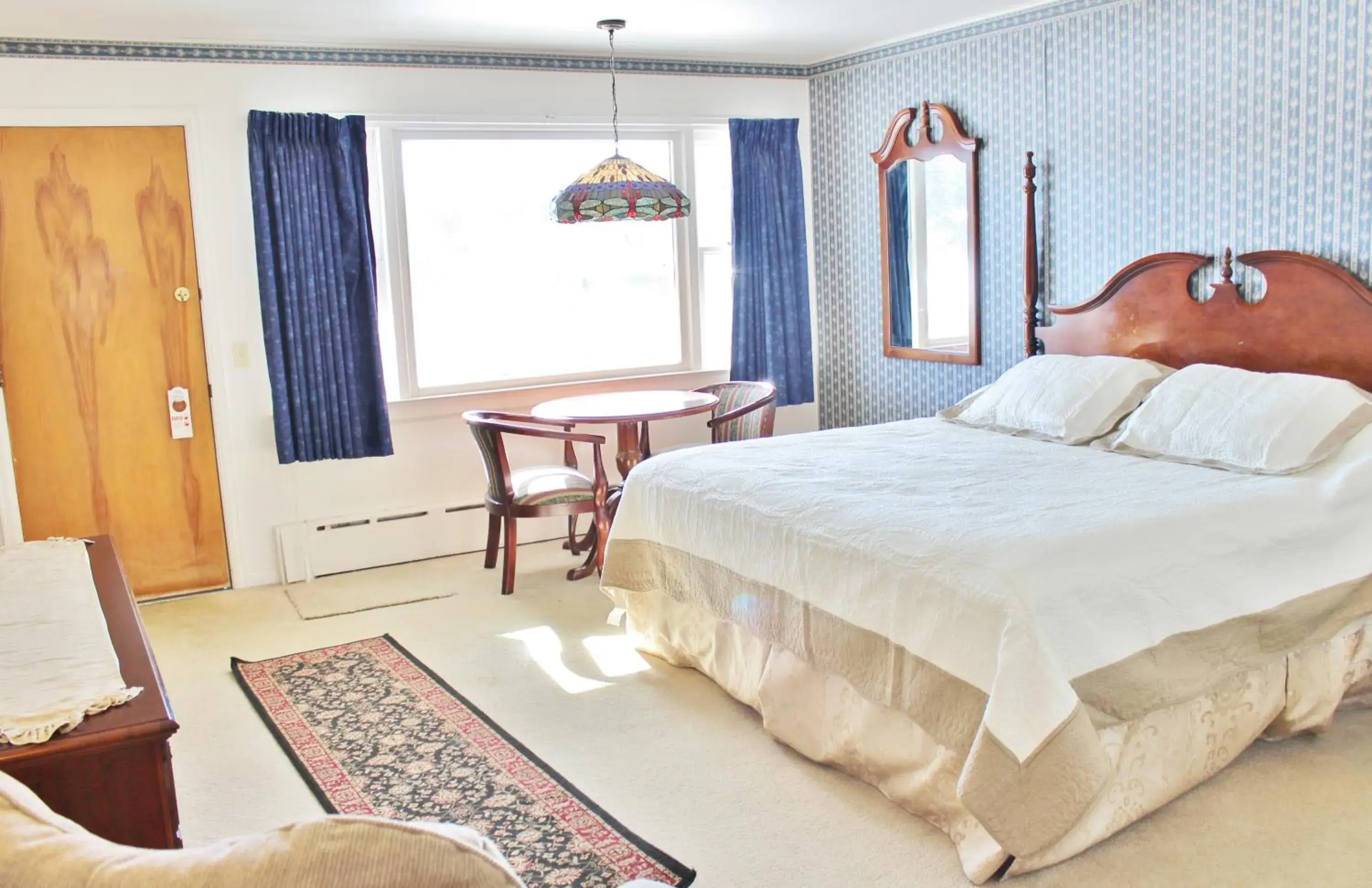 King Room with Partial Lake View in Sara Placid Inn & Suites King Room with Partial Lake View in Sara Placid Inn & Suites