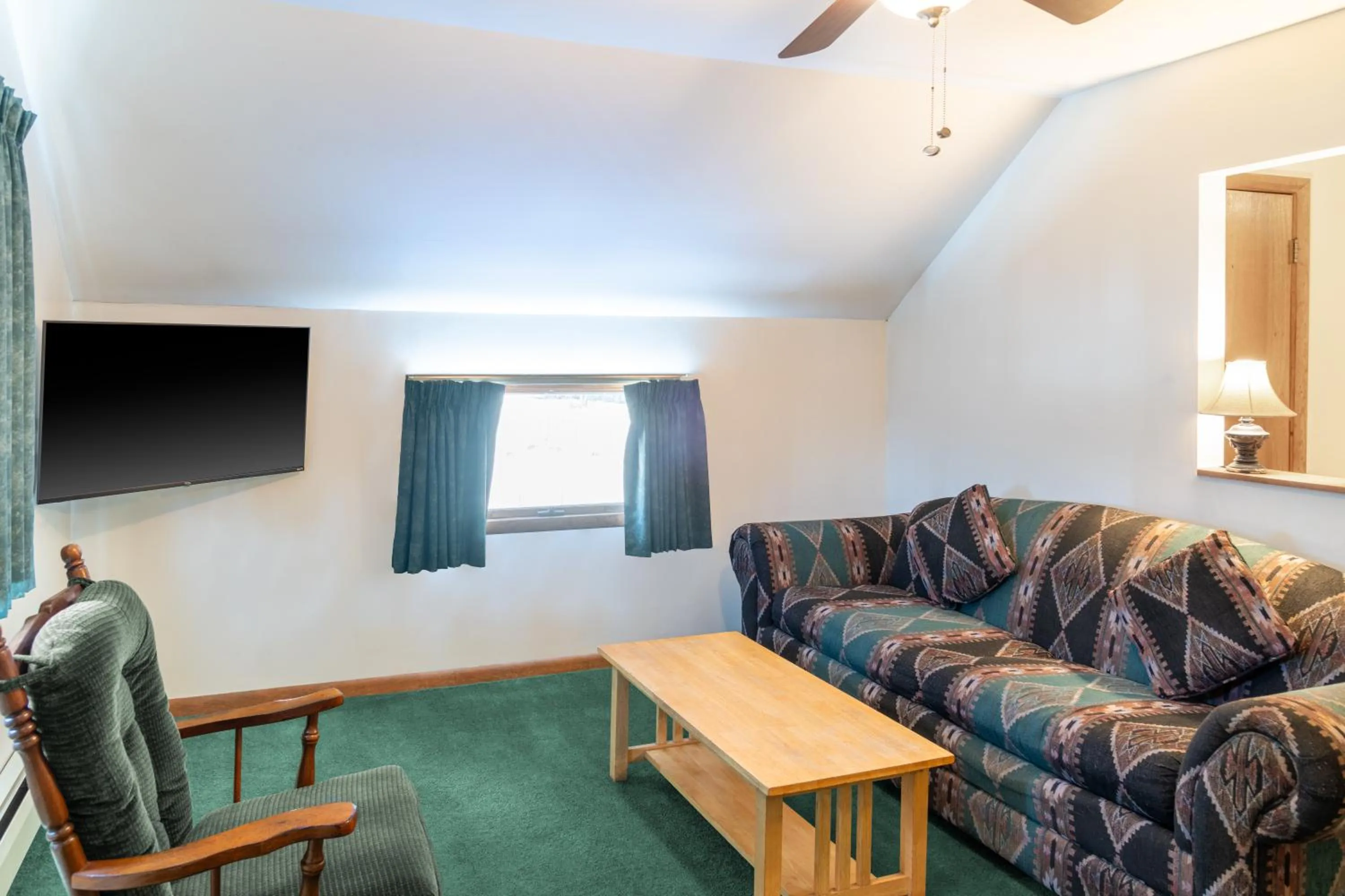 Living room in Sara Placid Inn & Suites