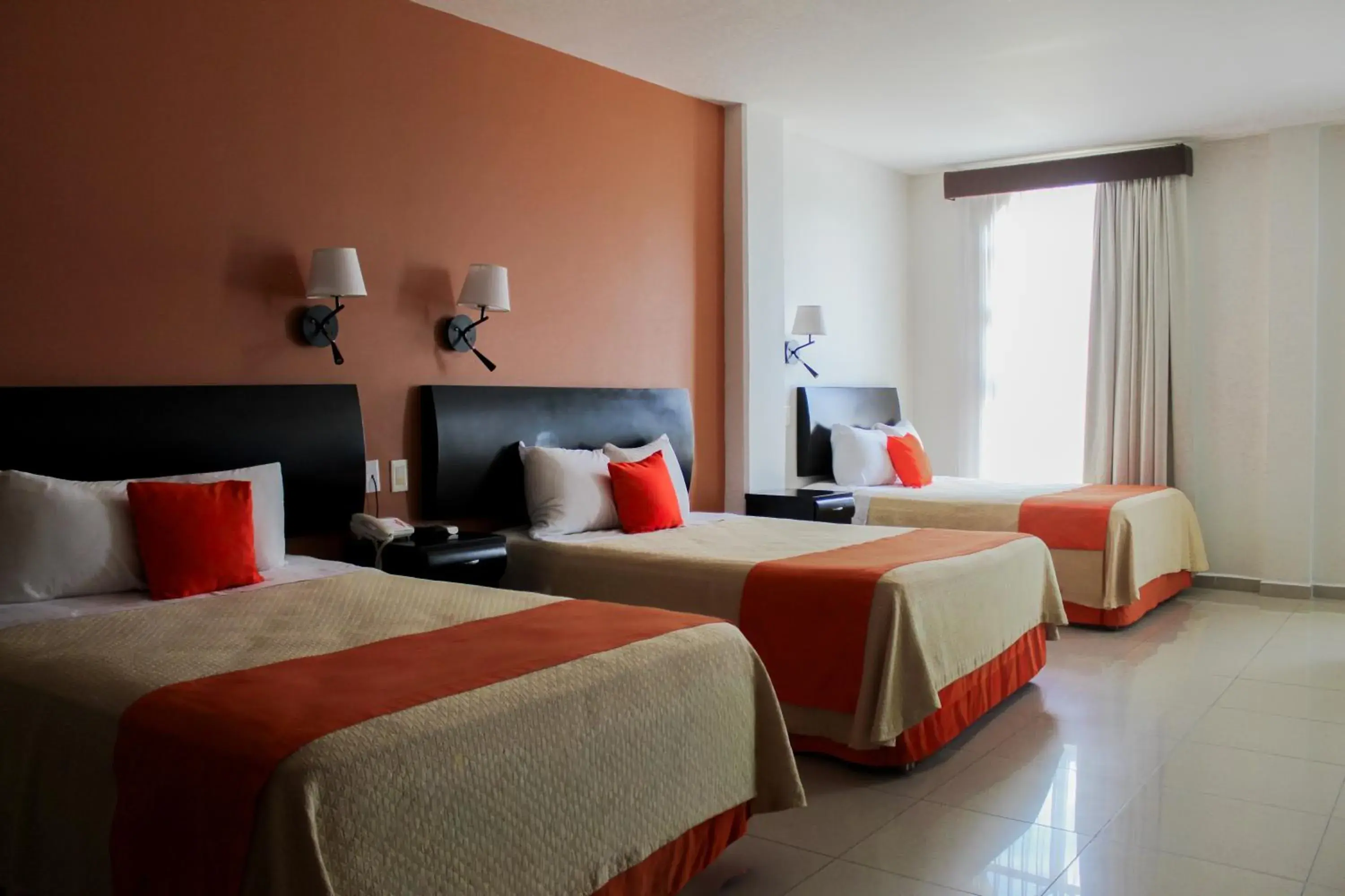 Basic Triple Room in Hotel Baez Paraiso Basic Triple Room in Hotel Baez Paraiso