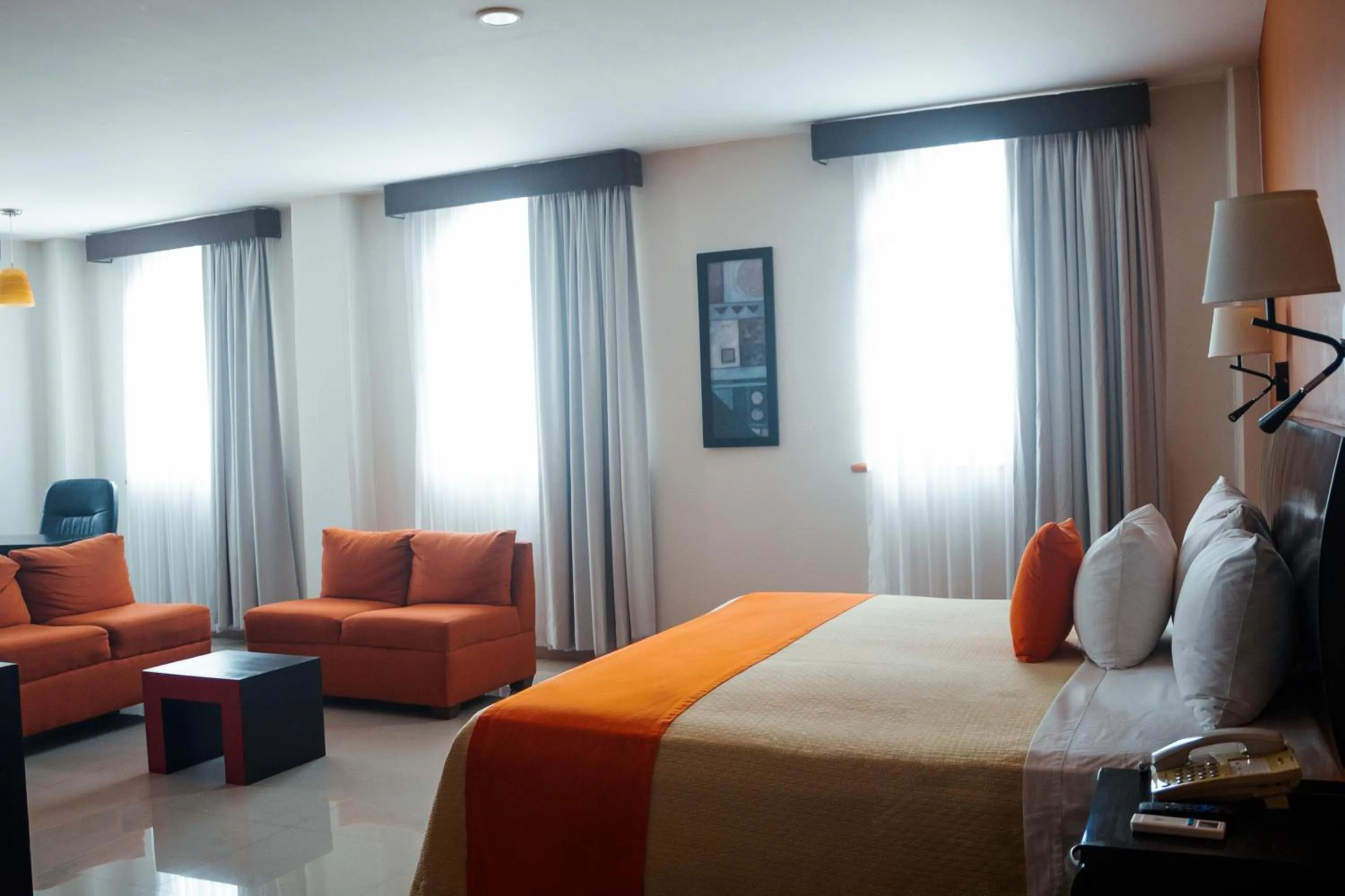 Living room, Bed in Hotel Baez Paraiso