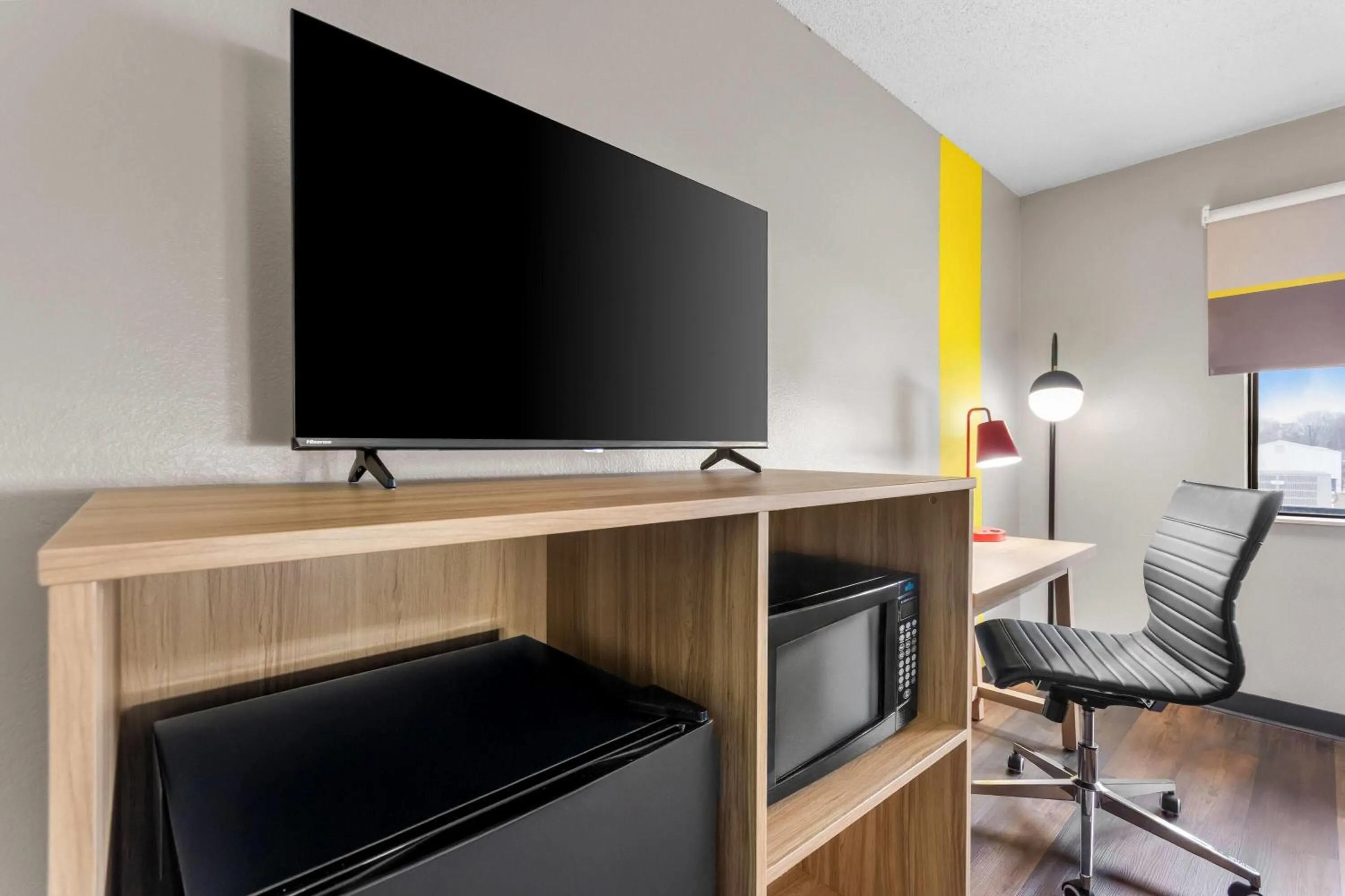 Bed in Super 8 by Wyndham Evansville East