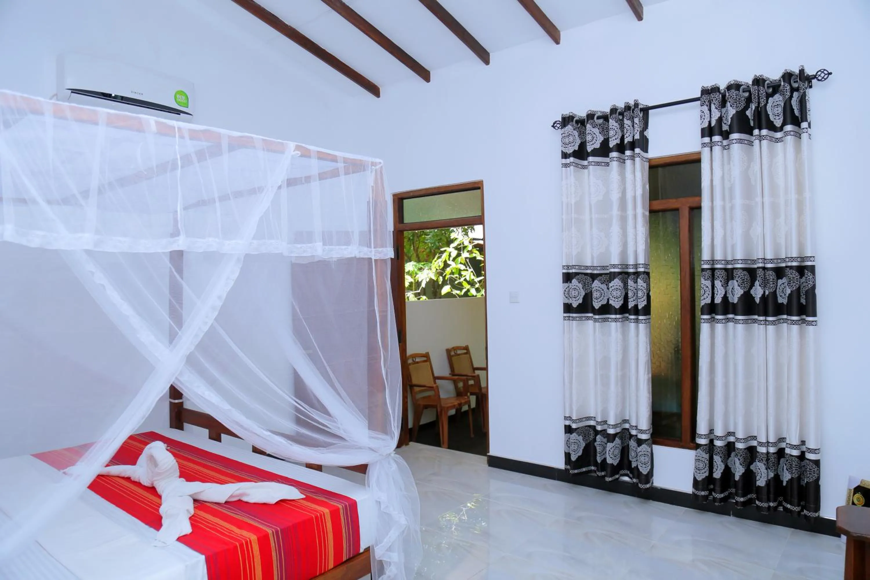 Bed in Sigiri Mango Garden Eco Resort