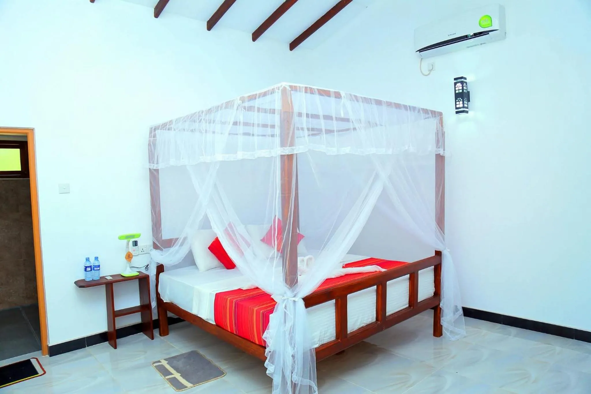 Bed in Sigiri Mango Garden Eco Resort