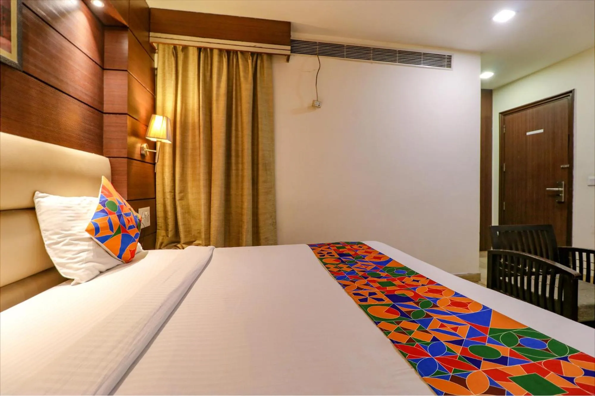 Bed in FabHotel Admire Suites