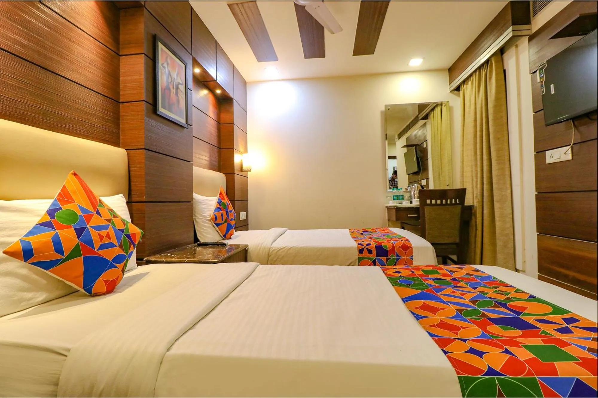 Bed in FabHotel Admire Suites