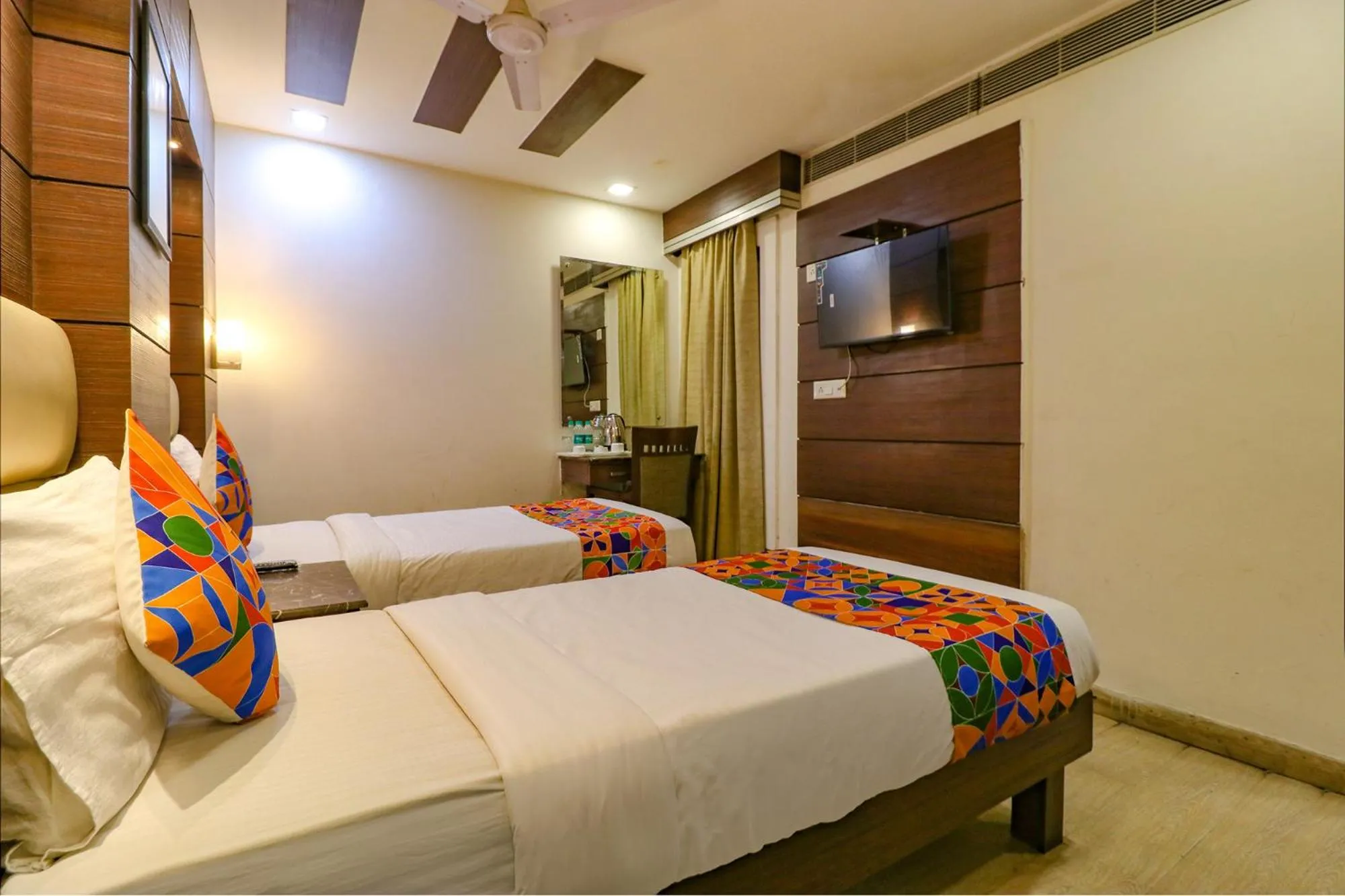 Bed in FabHotel Admire Suites