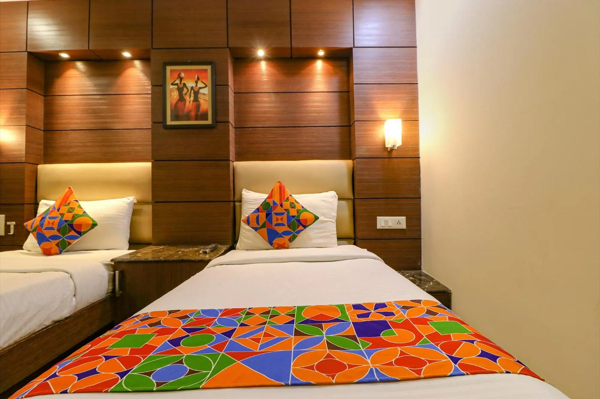 Bed in FabHotel Admire Suites