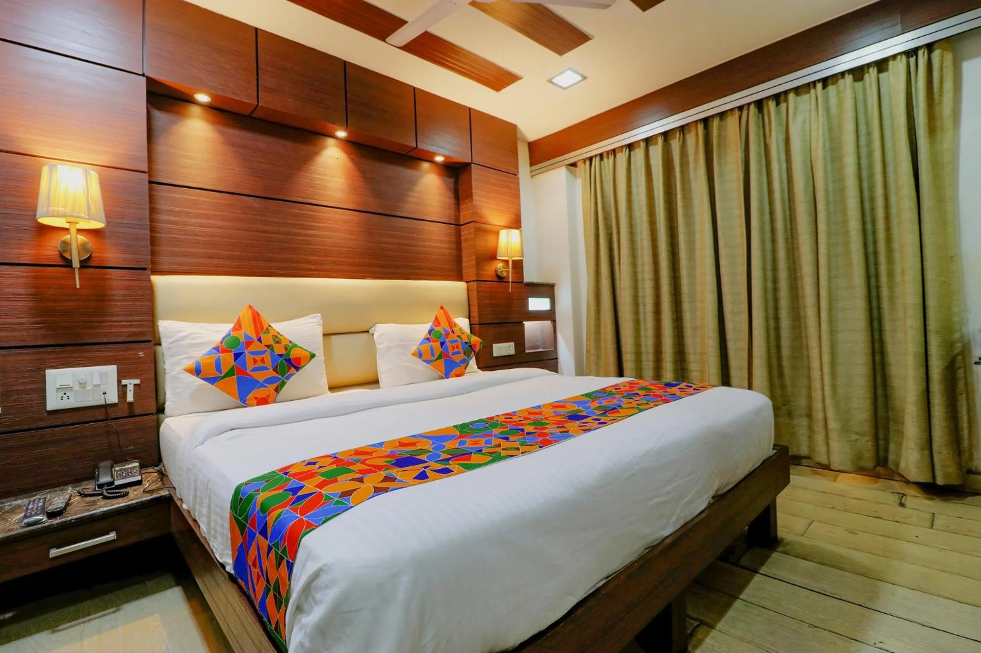 Bed in FabHotel Admire Suites