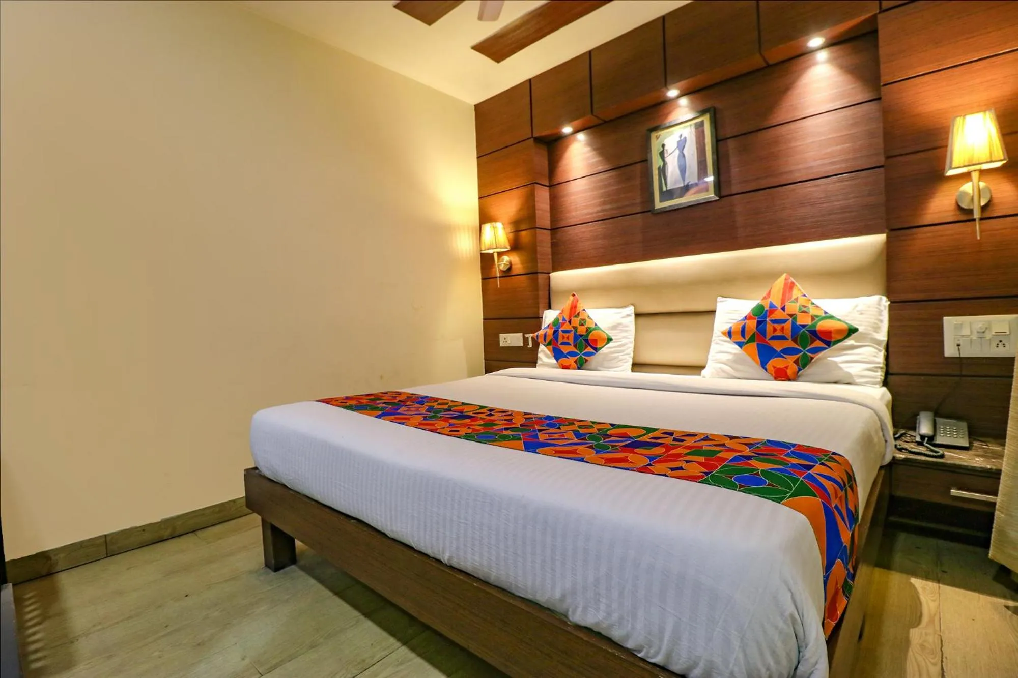 Bed in FabHotel Admire Suites