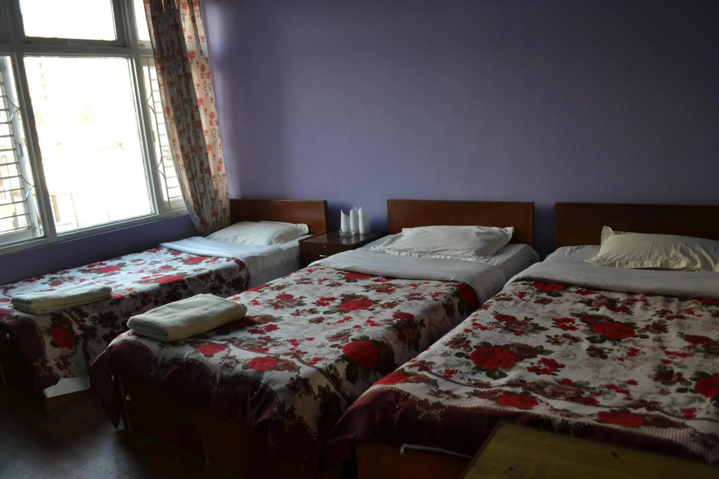 Bed in Hotel Discovery Inn