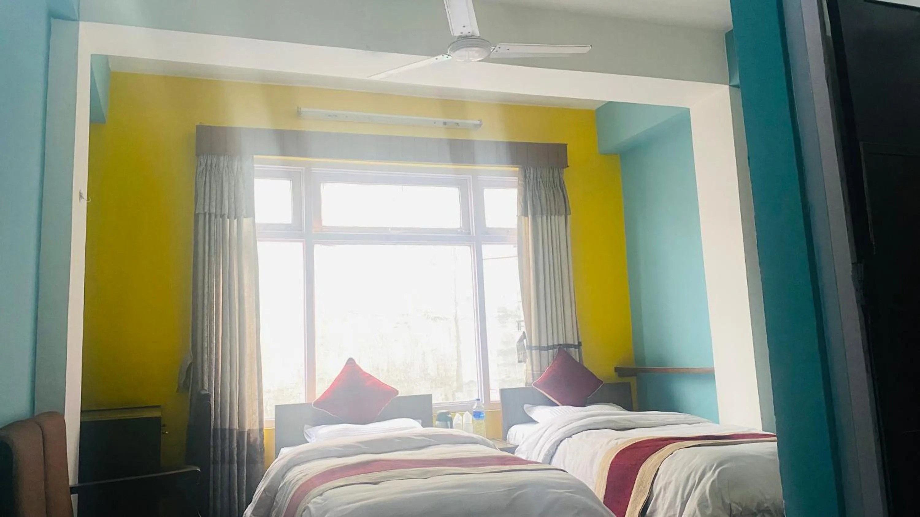 Bed in Hotel Discovery Inn