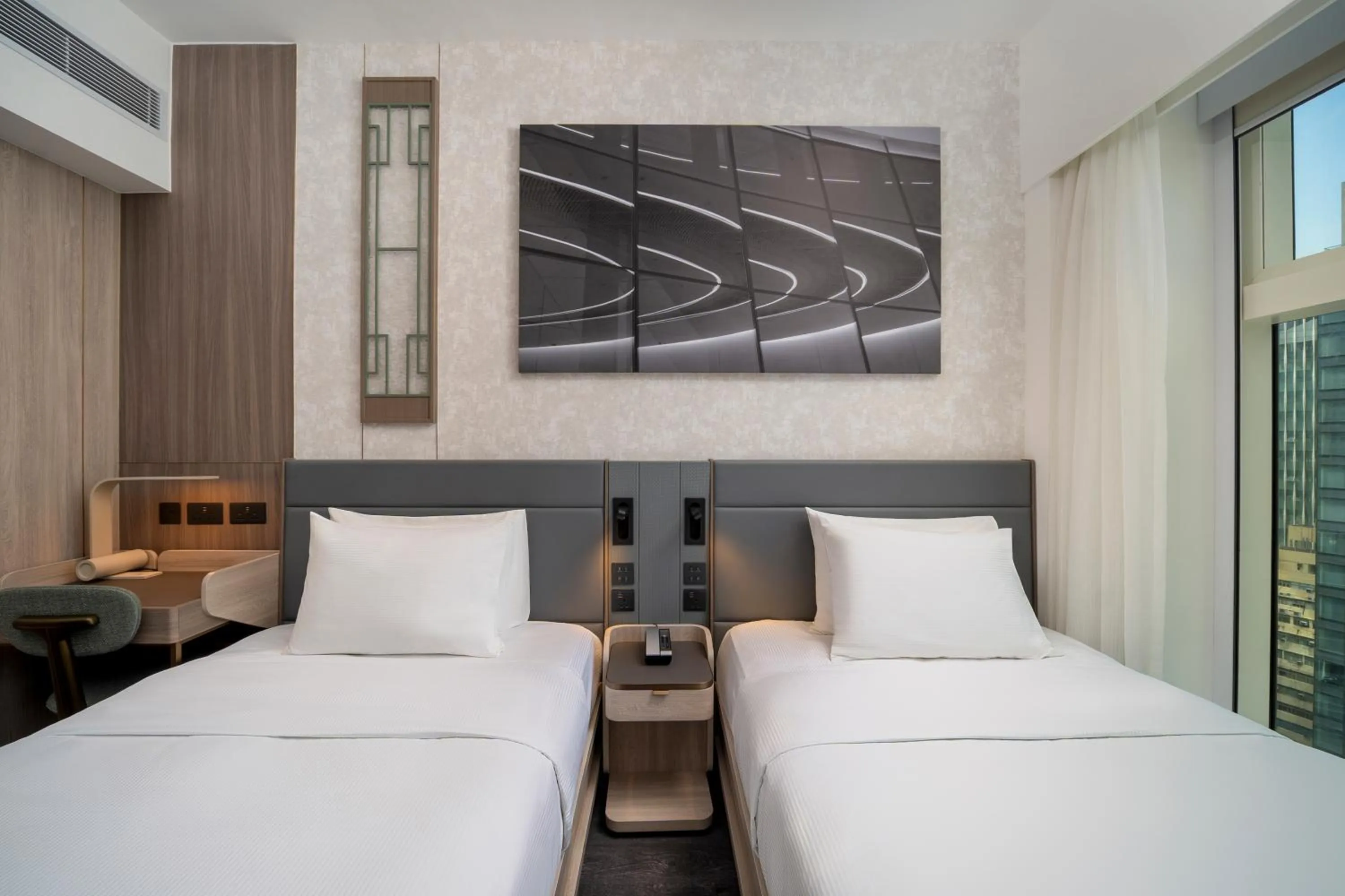 Bed in Motto by Hilton Hong Kong Soho