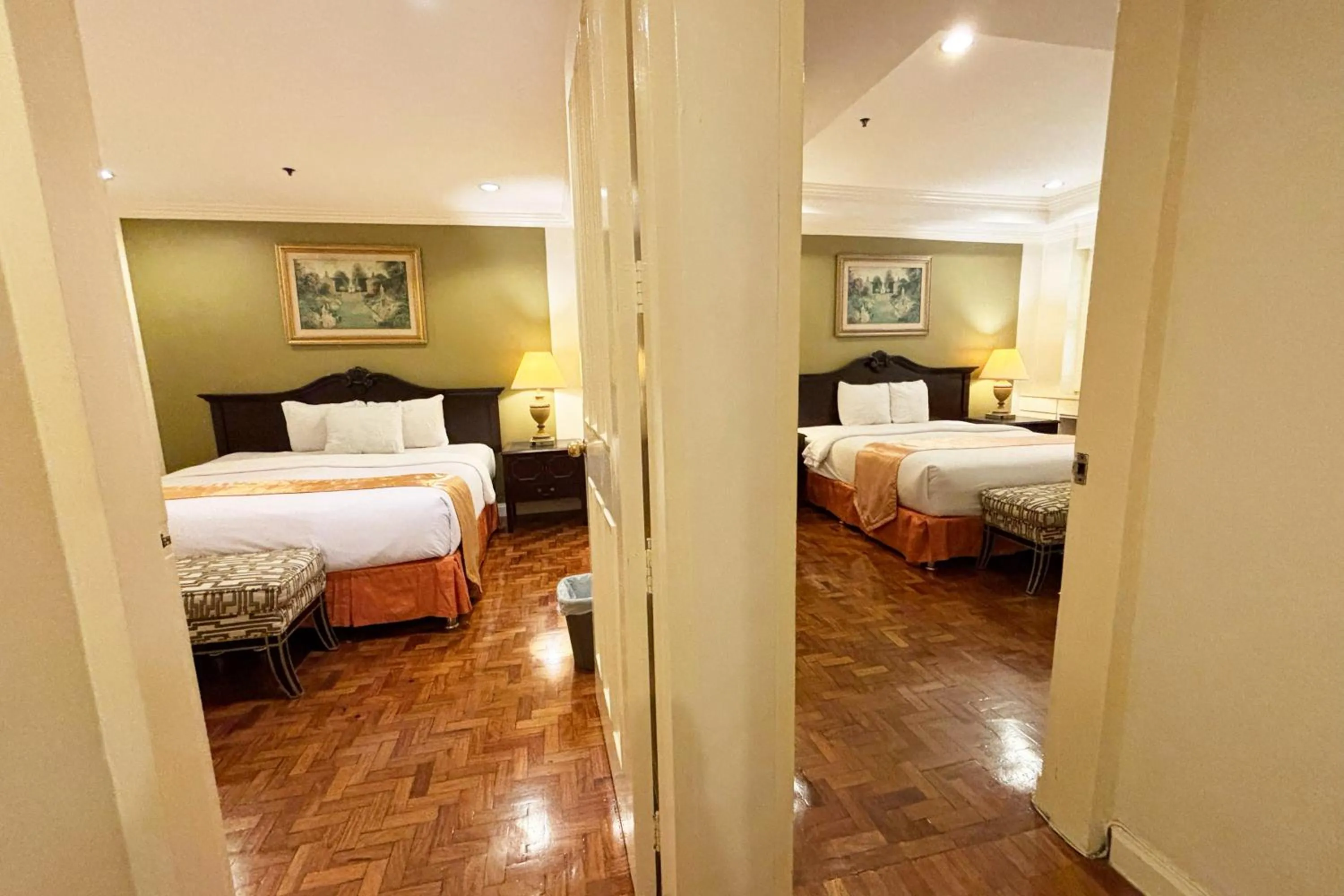 Bed in Lourdes Family Suites Makati powered by Cocotel