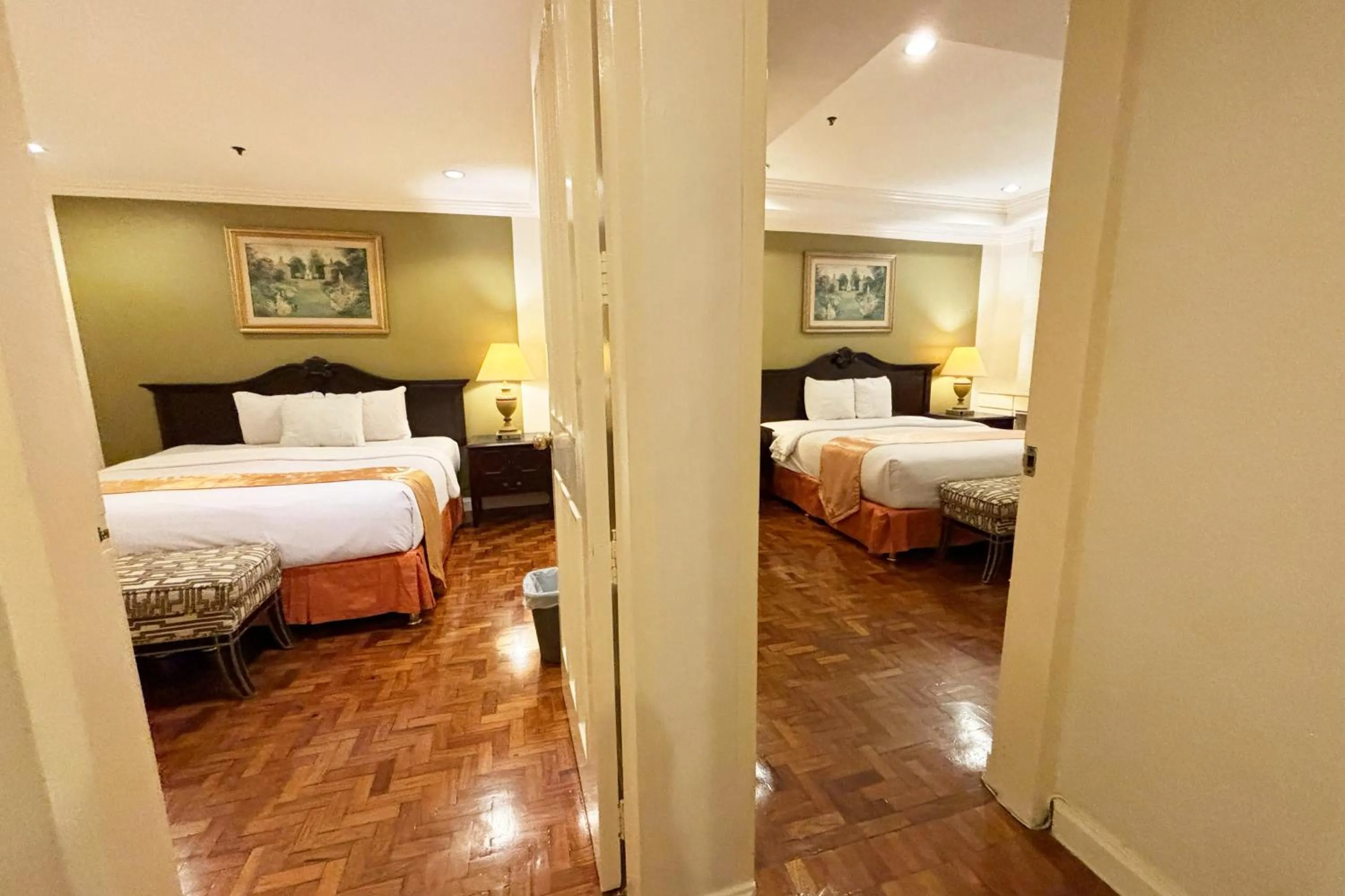 Bed in Lourdes Family Suites Makati powered by Cocotel
