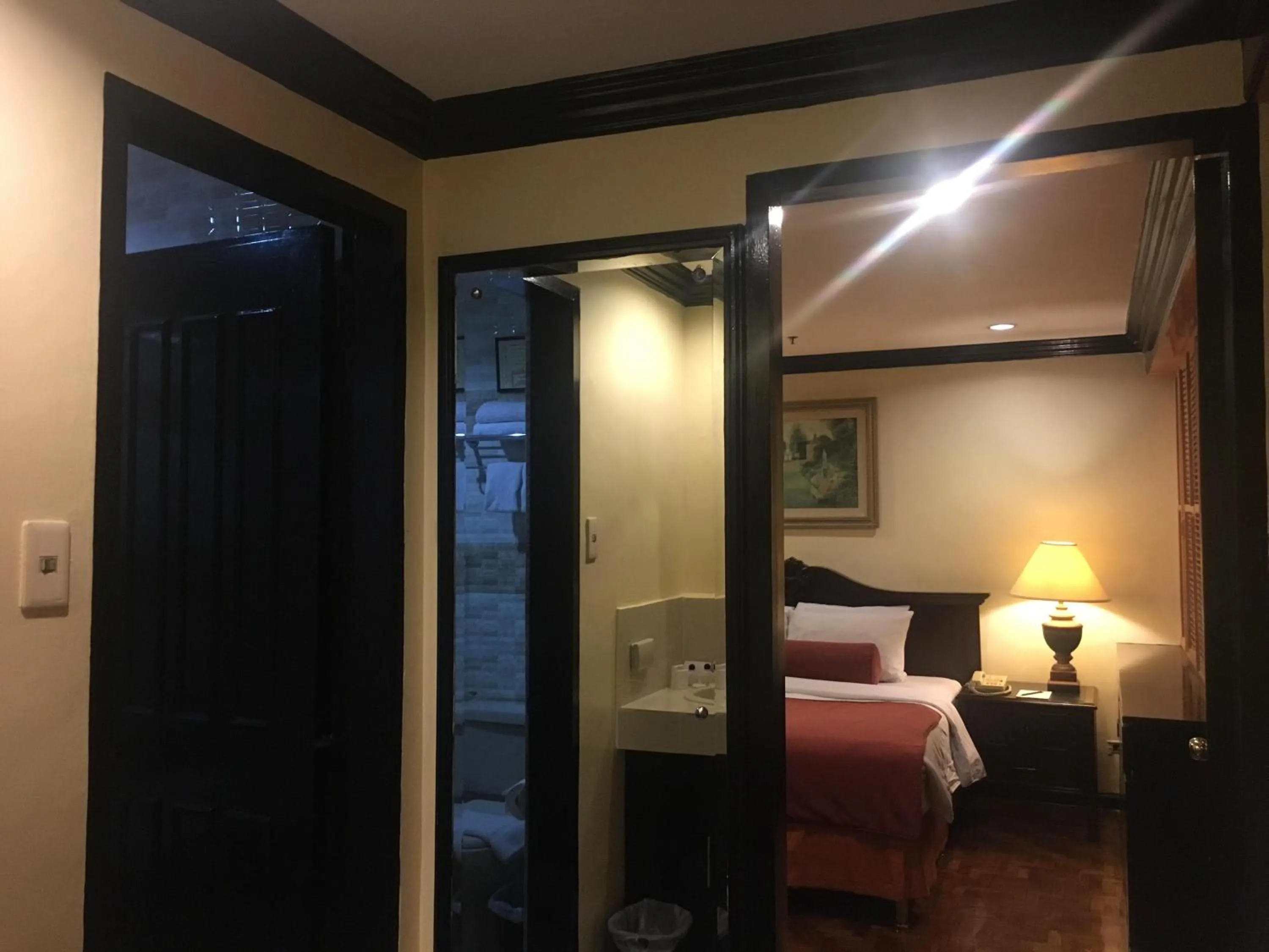 Bed in Lourdes Family Suites Makati powered by Cocotel