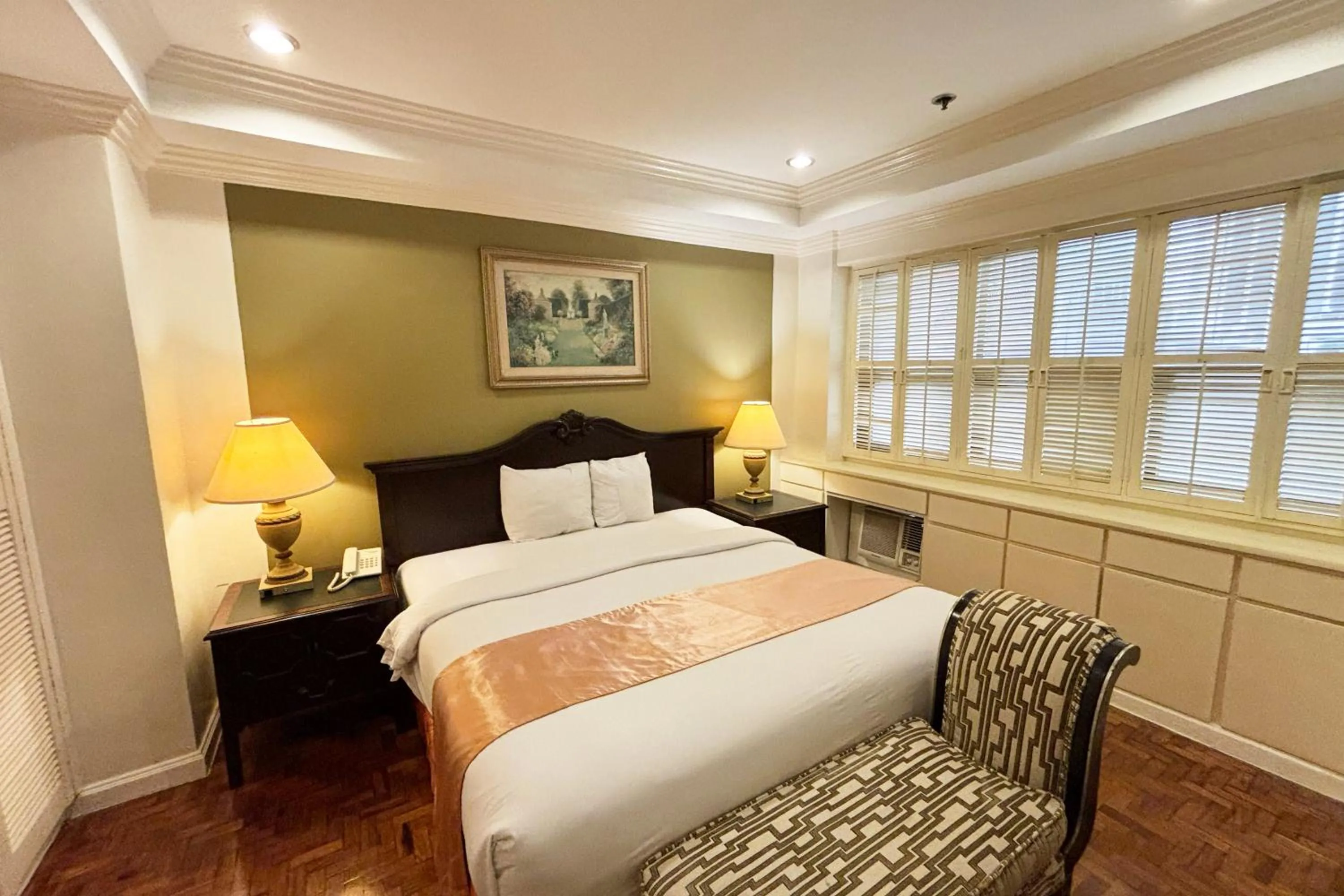 Bed in Lourdes Family Suites Makati powered by Cocotel